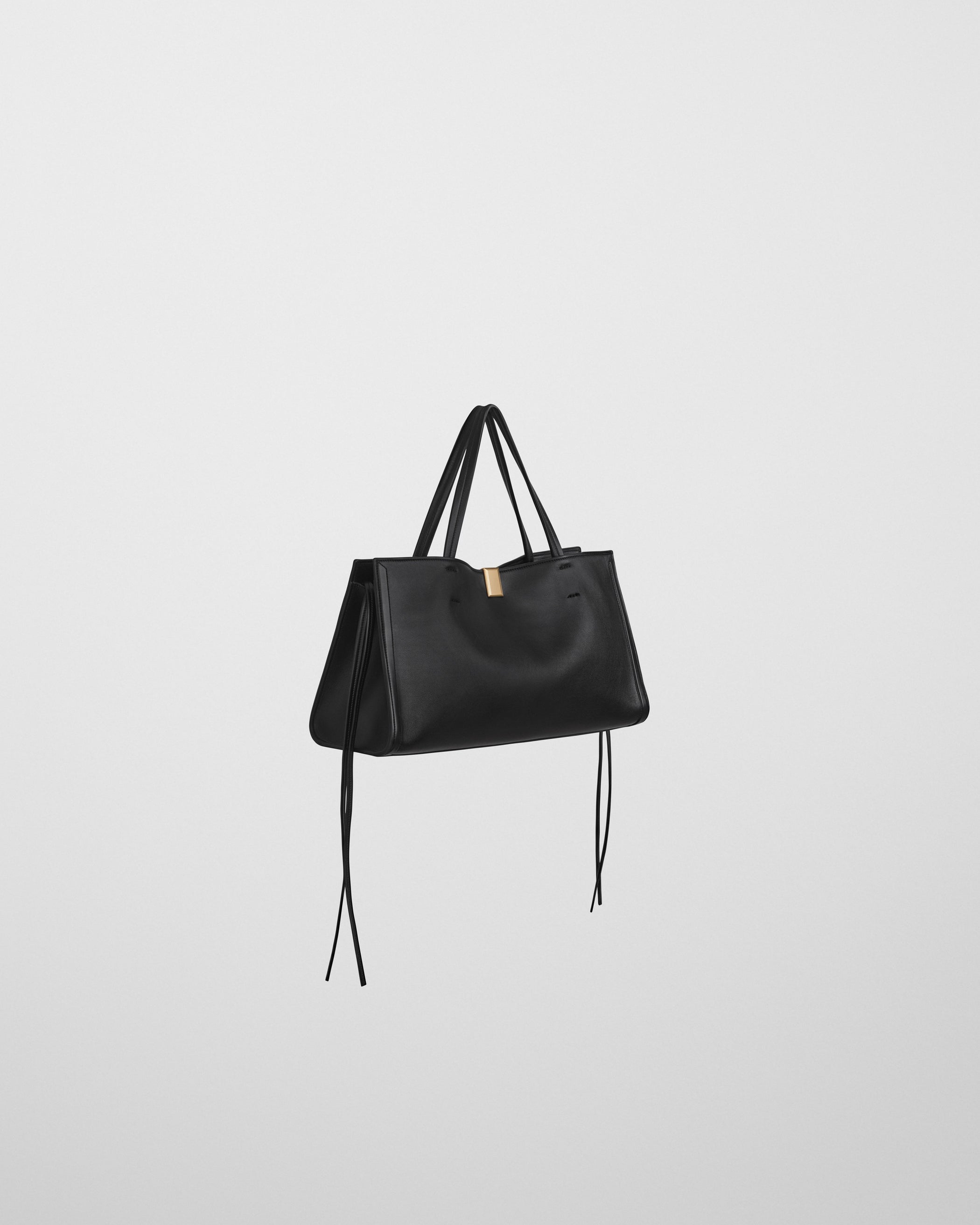 Side view of SMALL KIT CABAS in black leather with gold