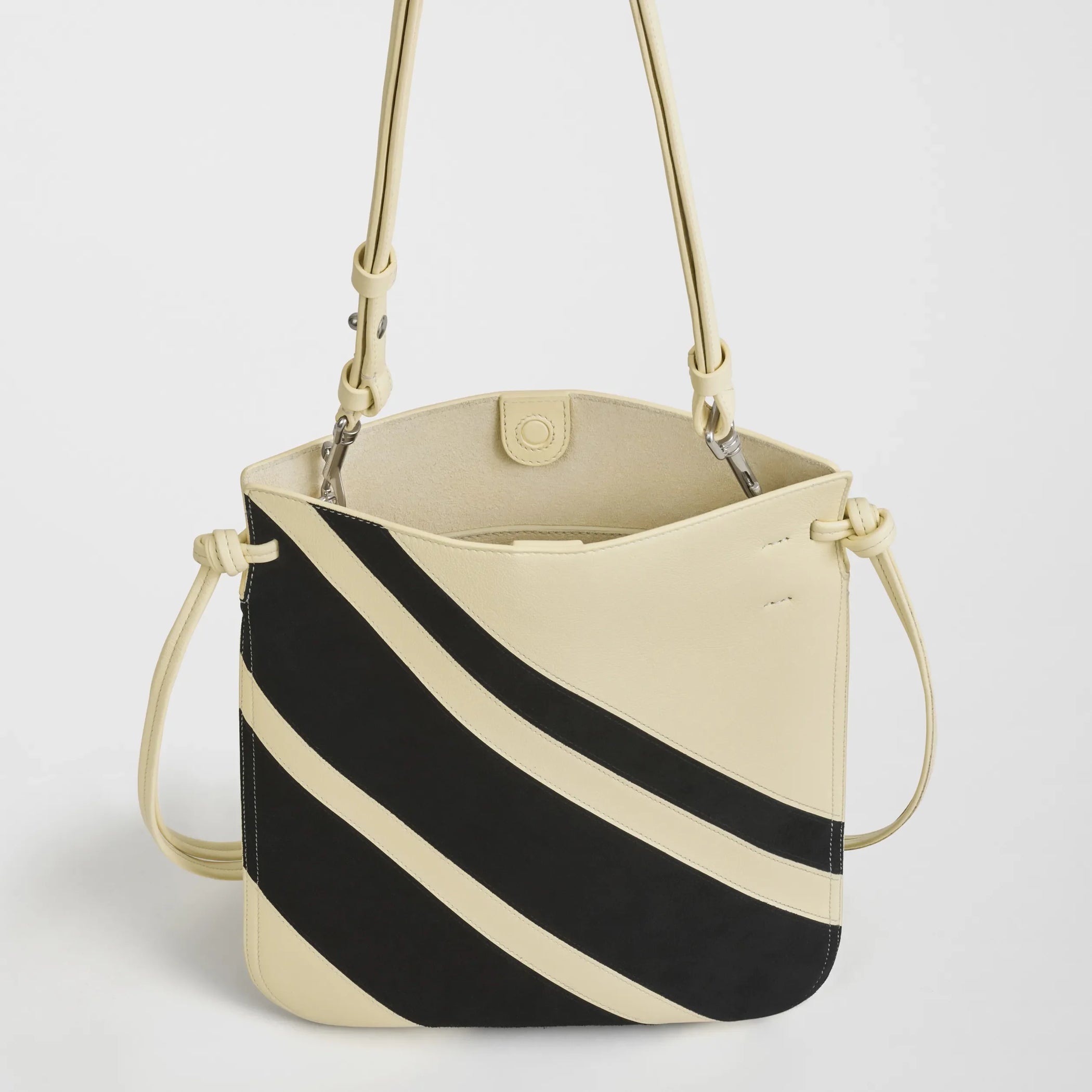 Detail view of gig pouch in black white leather