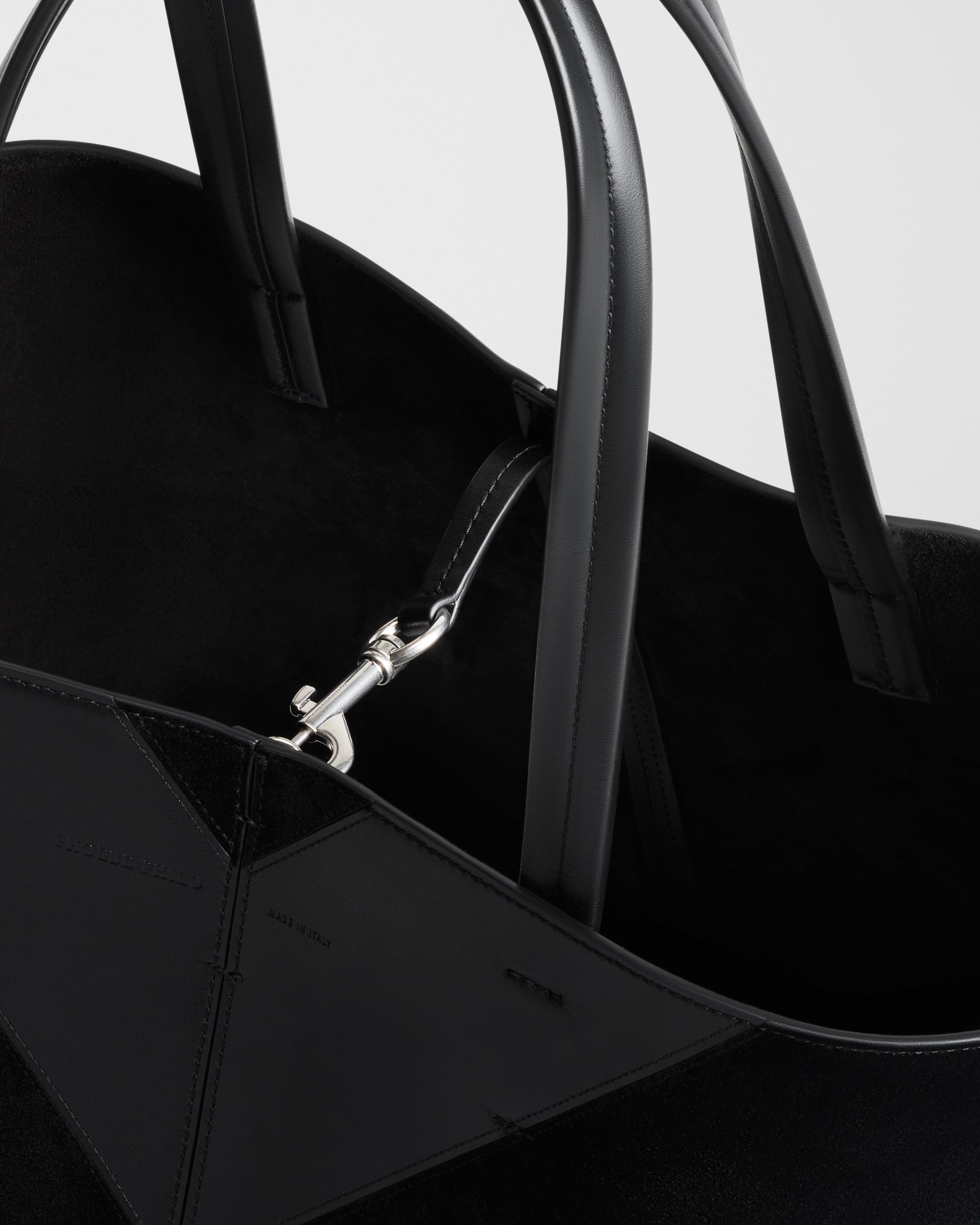 Close up view of POT CABAS BAG in black suede leather