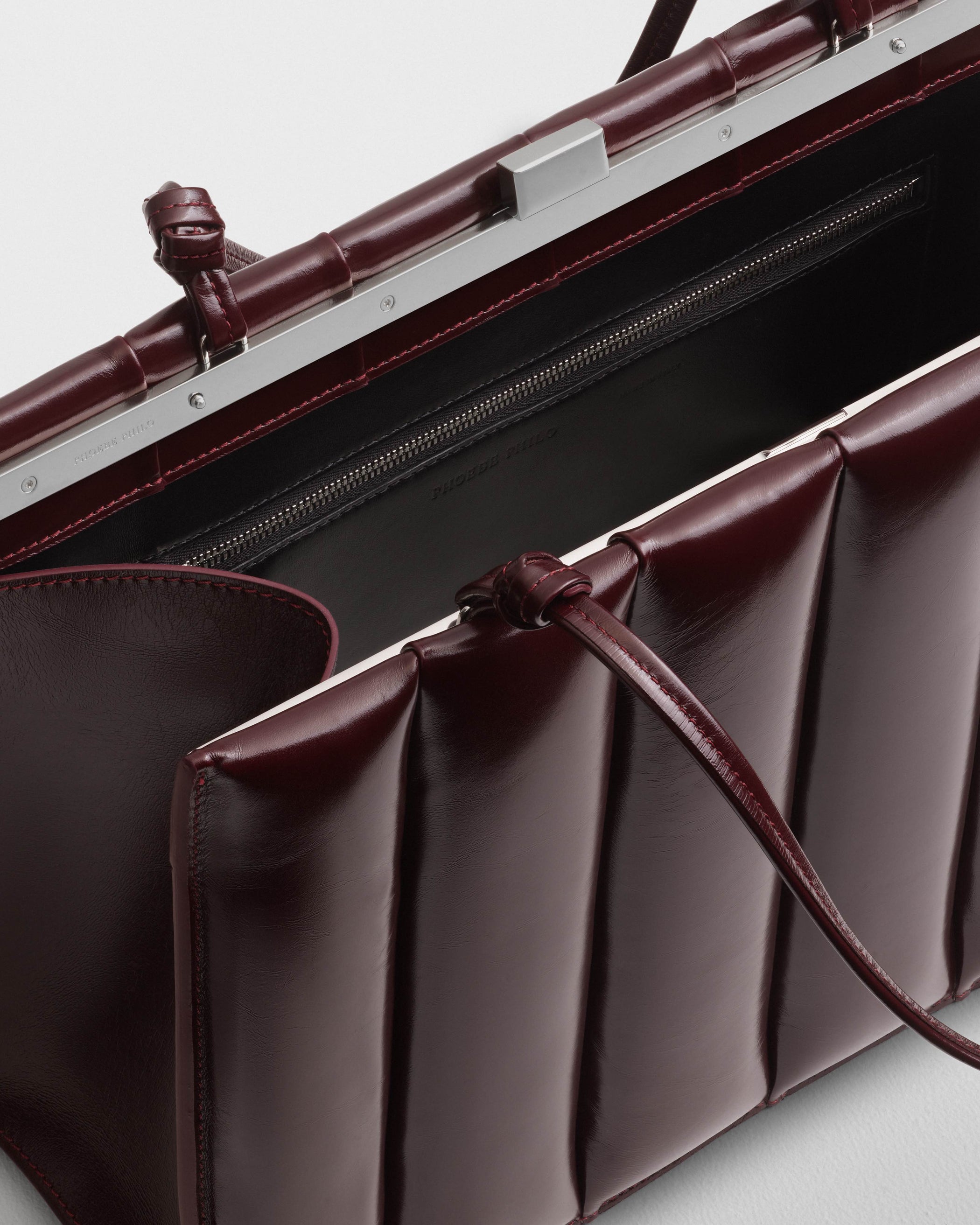 Close up view image of the Drive Bag in Oxblood leather
