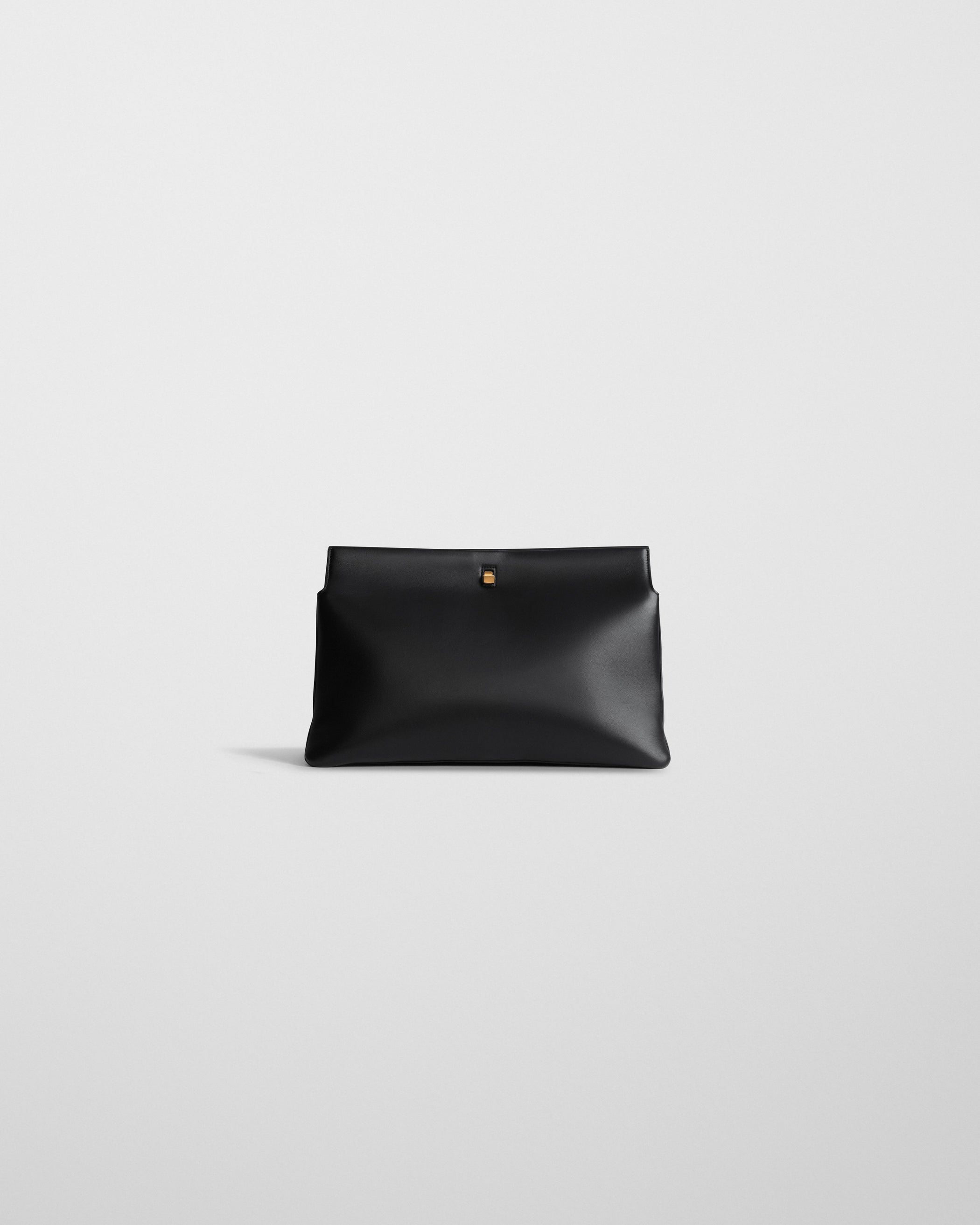 Front view of TRIPLEX CLUTCH BAG in black leather