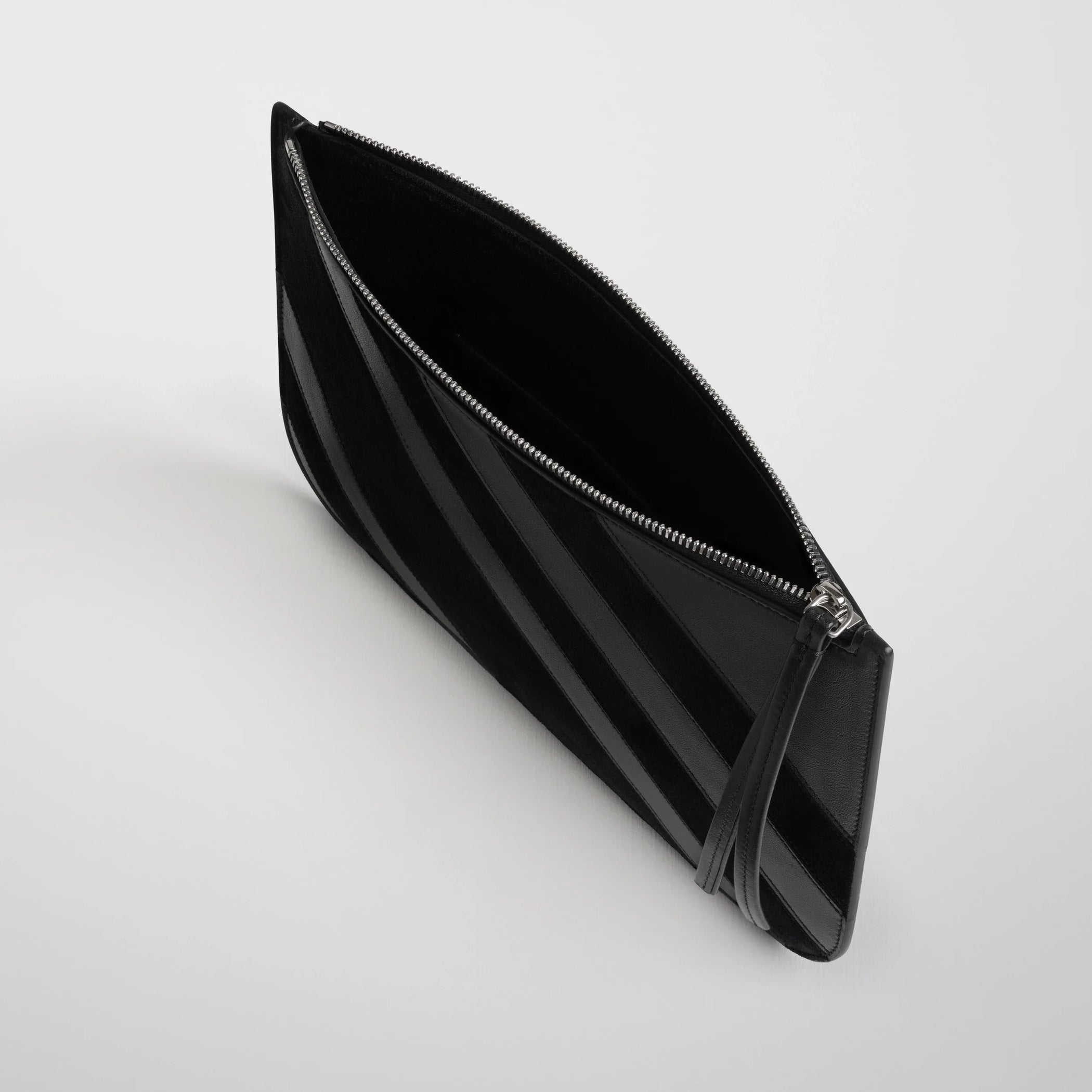Close up detail view of pocket pouch in black leather.