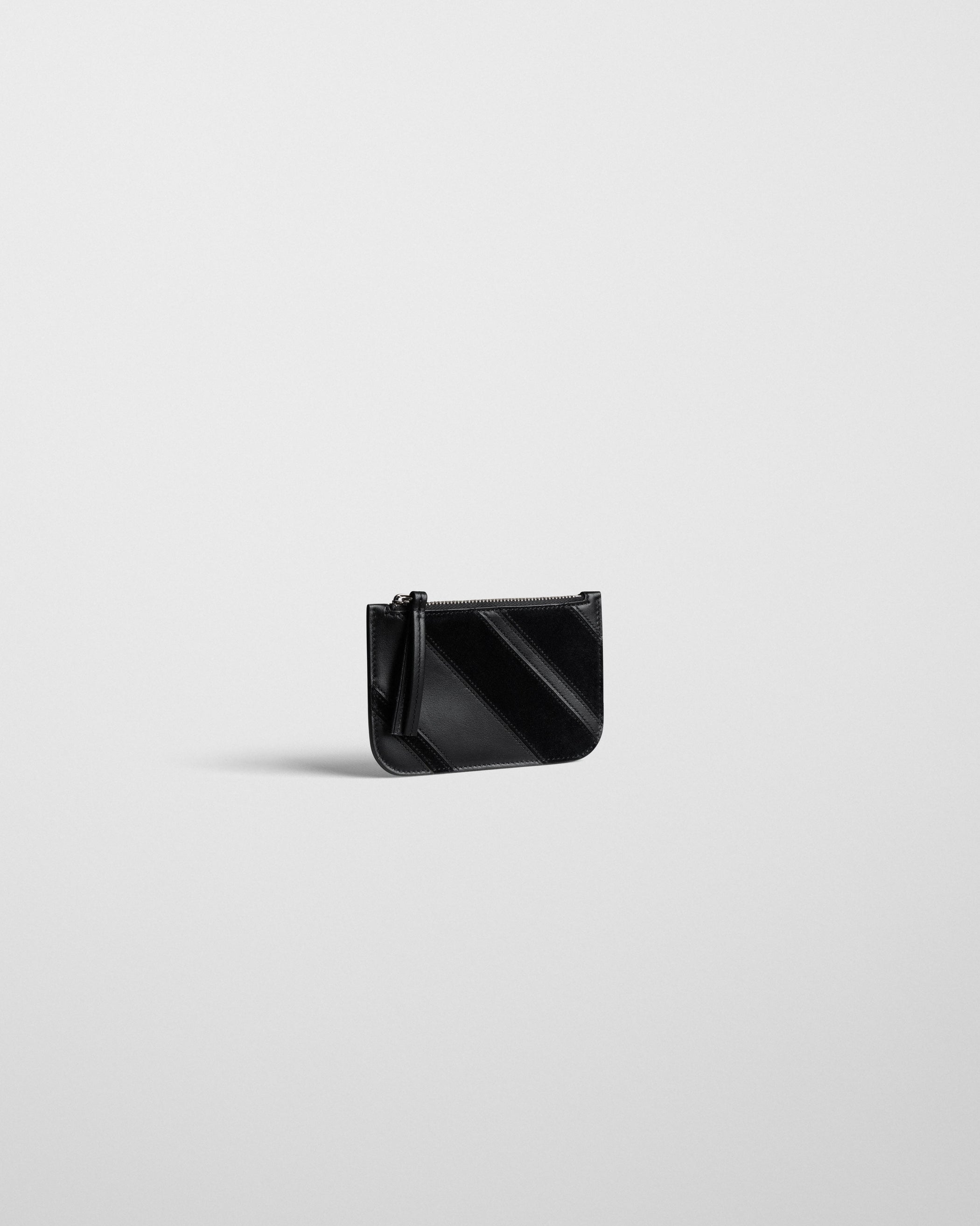 Angled front view of POCKET CARD HOLDER in black leather