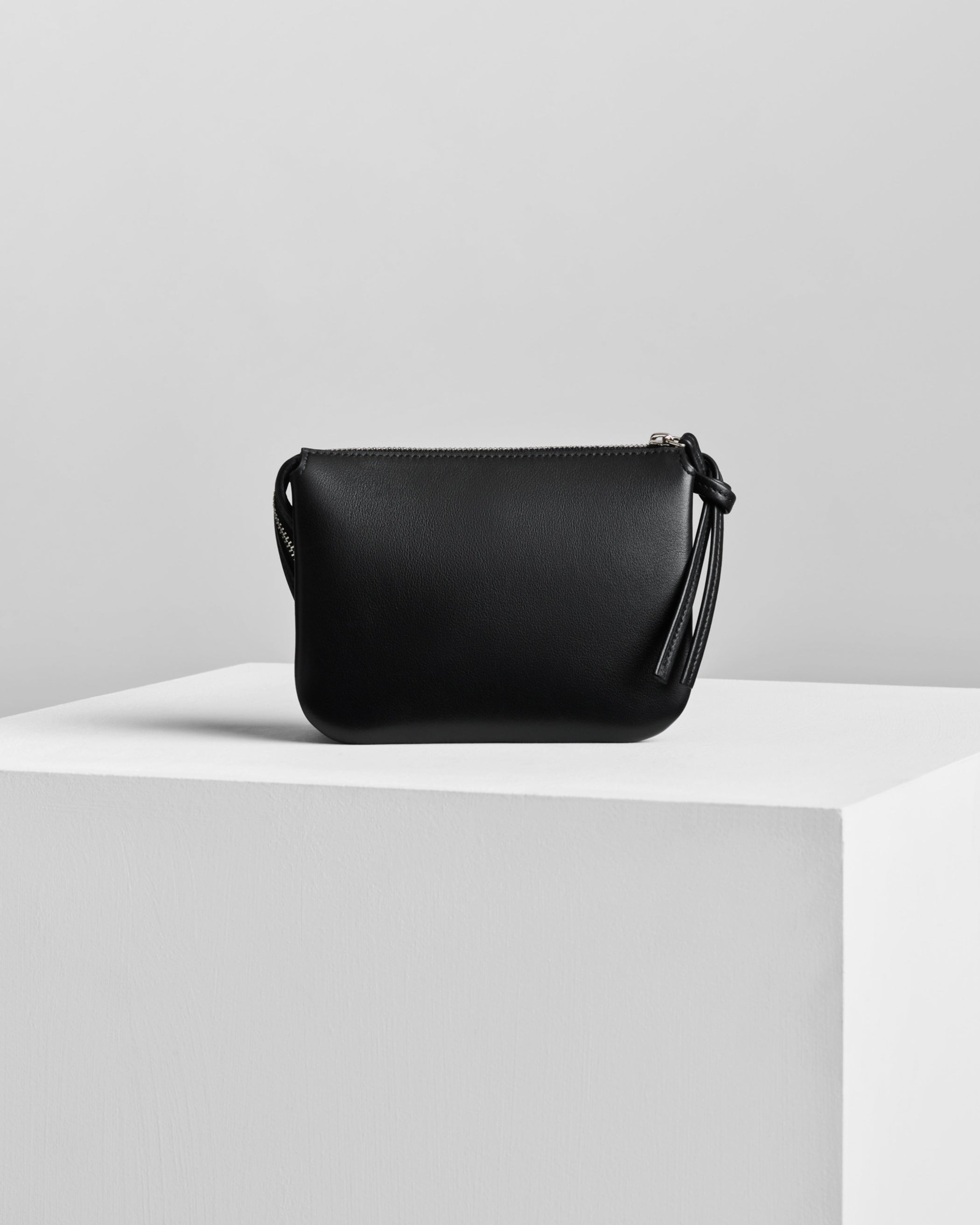 Back view of POCKET GIG in black leather