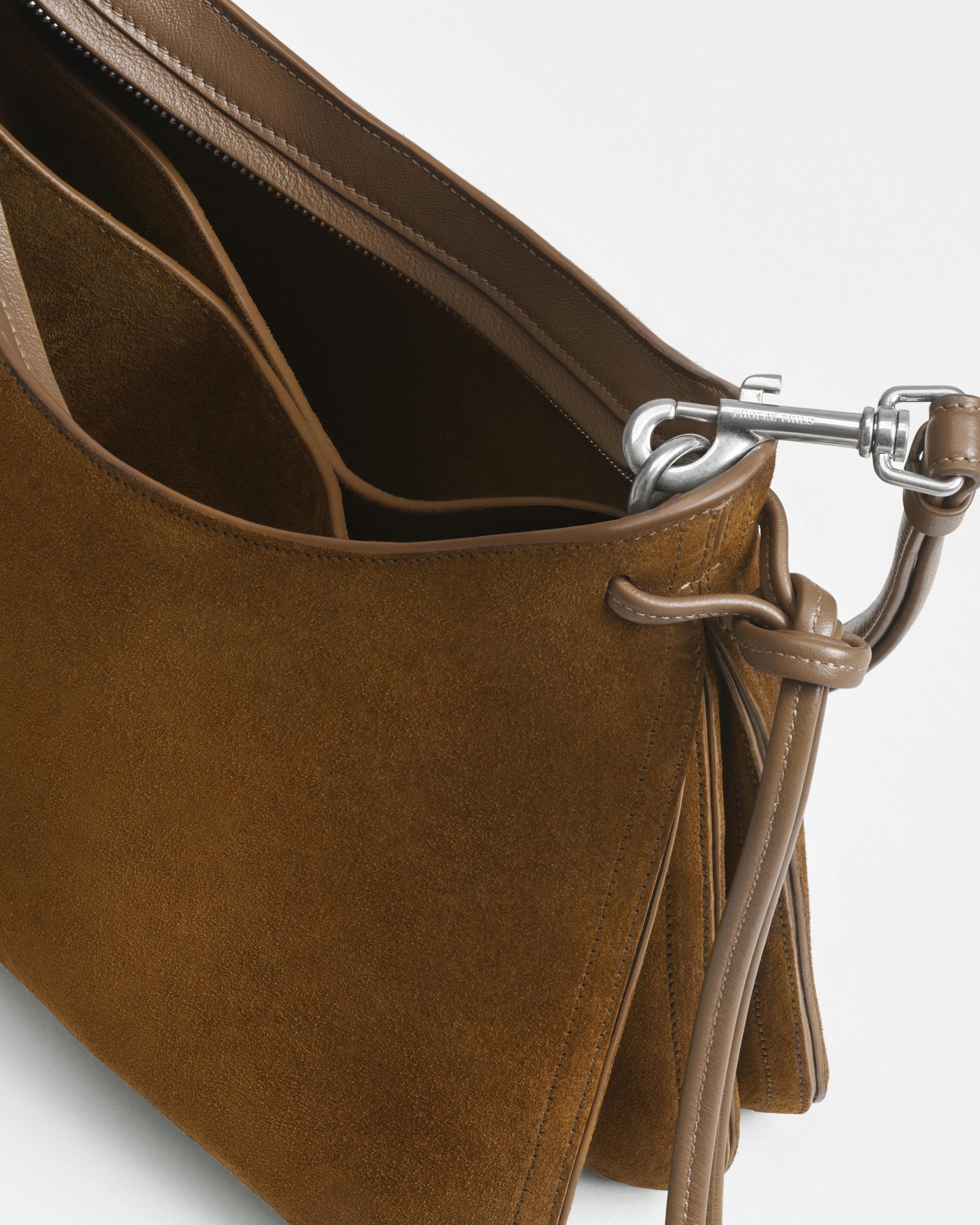 Detail view of SMALL GIG BAG in toffee suede