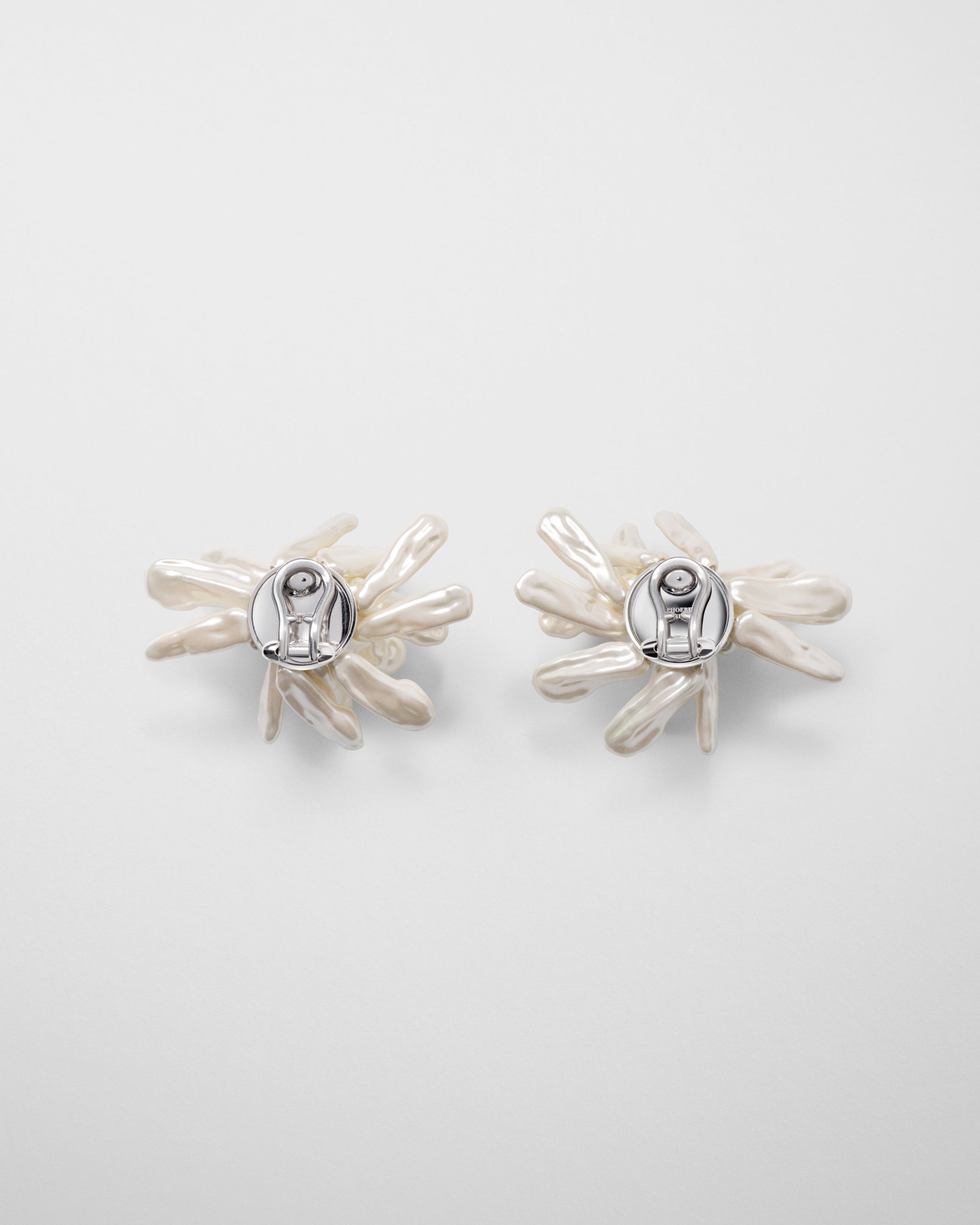 Back view of CLUSTER EARRINGS in silver cream resin