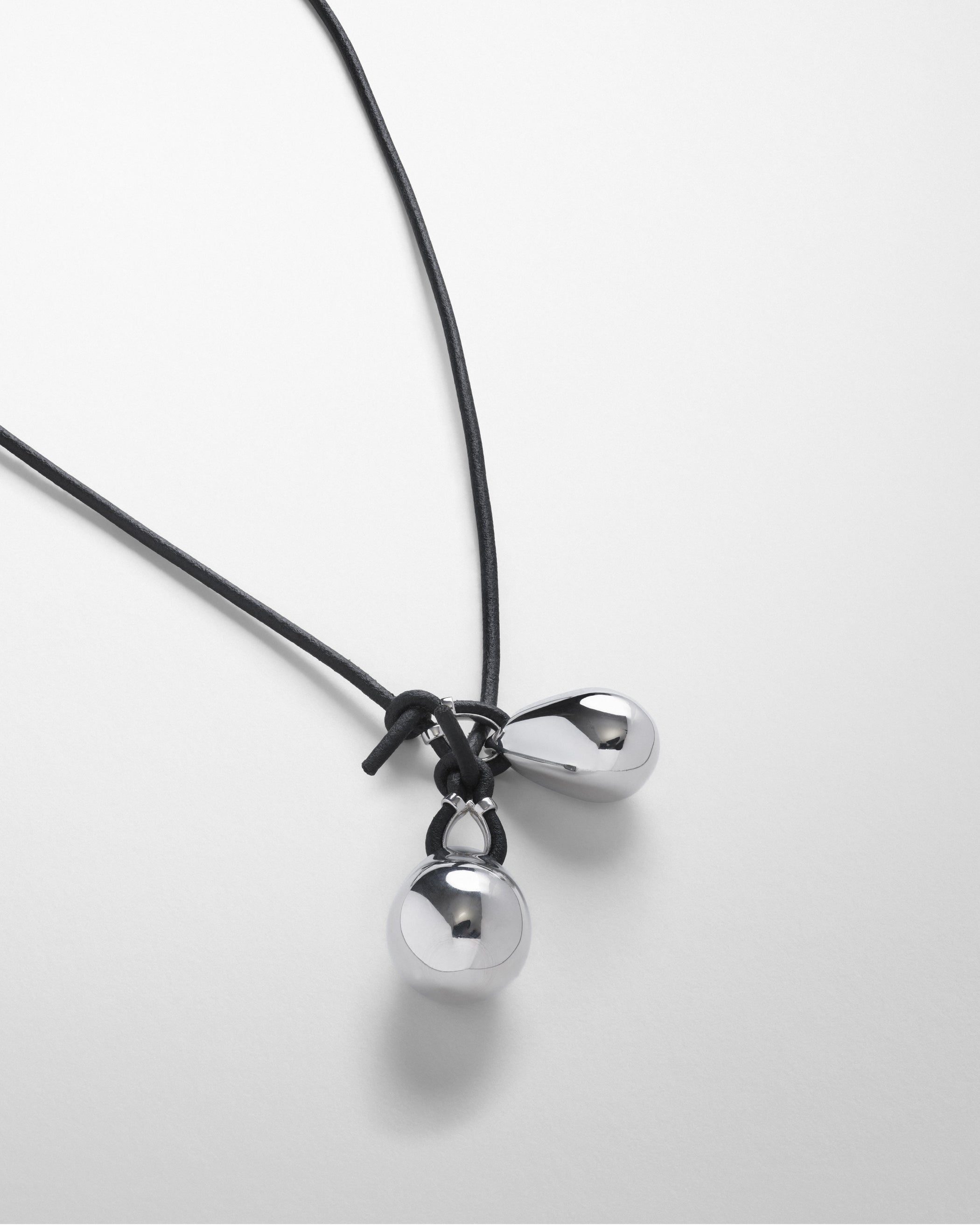 Detail view of PEBBLE DUO PENDANT in sterling silver
