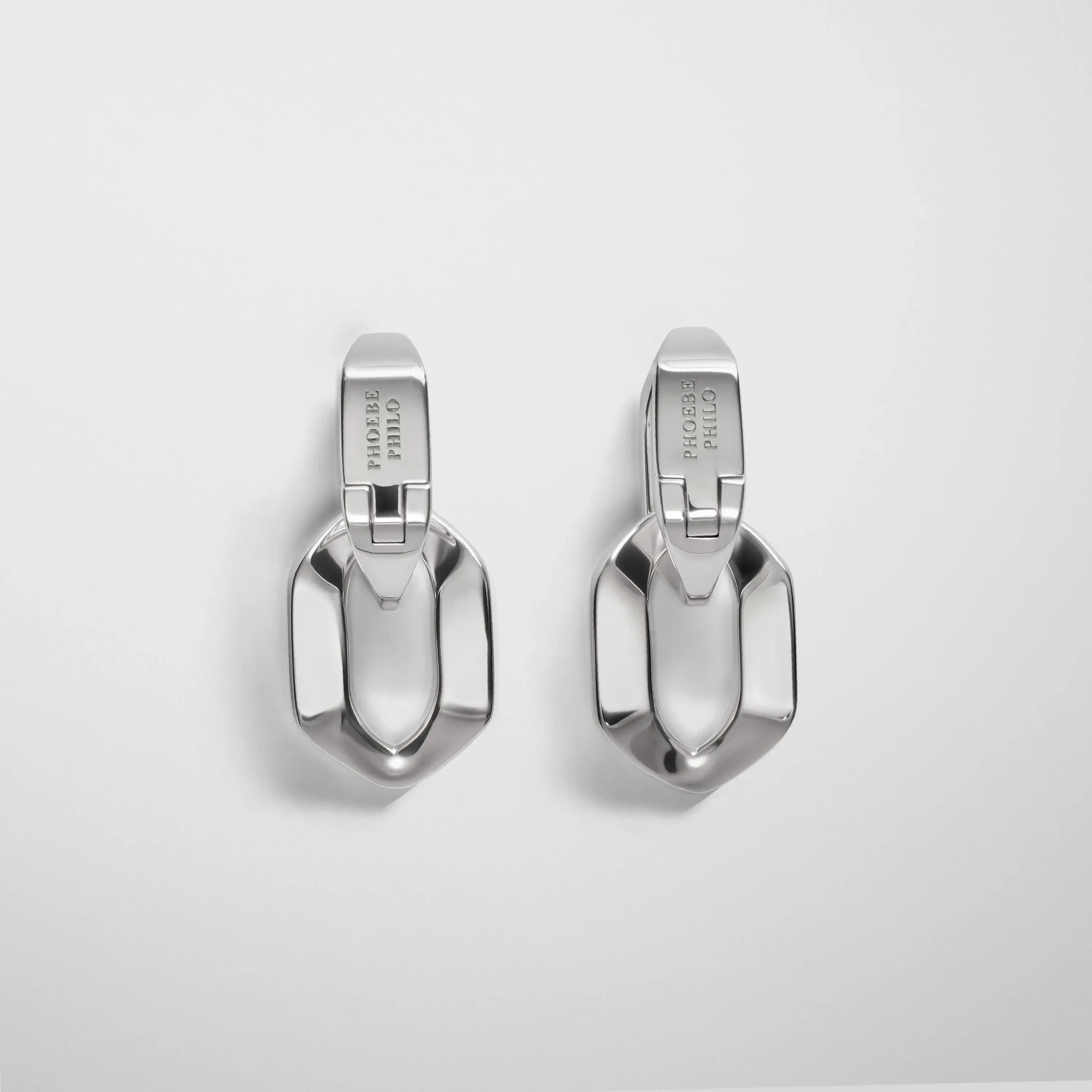 Flat lay backl view of Chain Link Earrings in sterling silver.