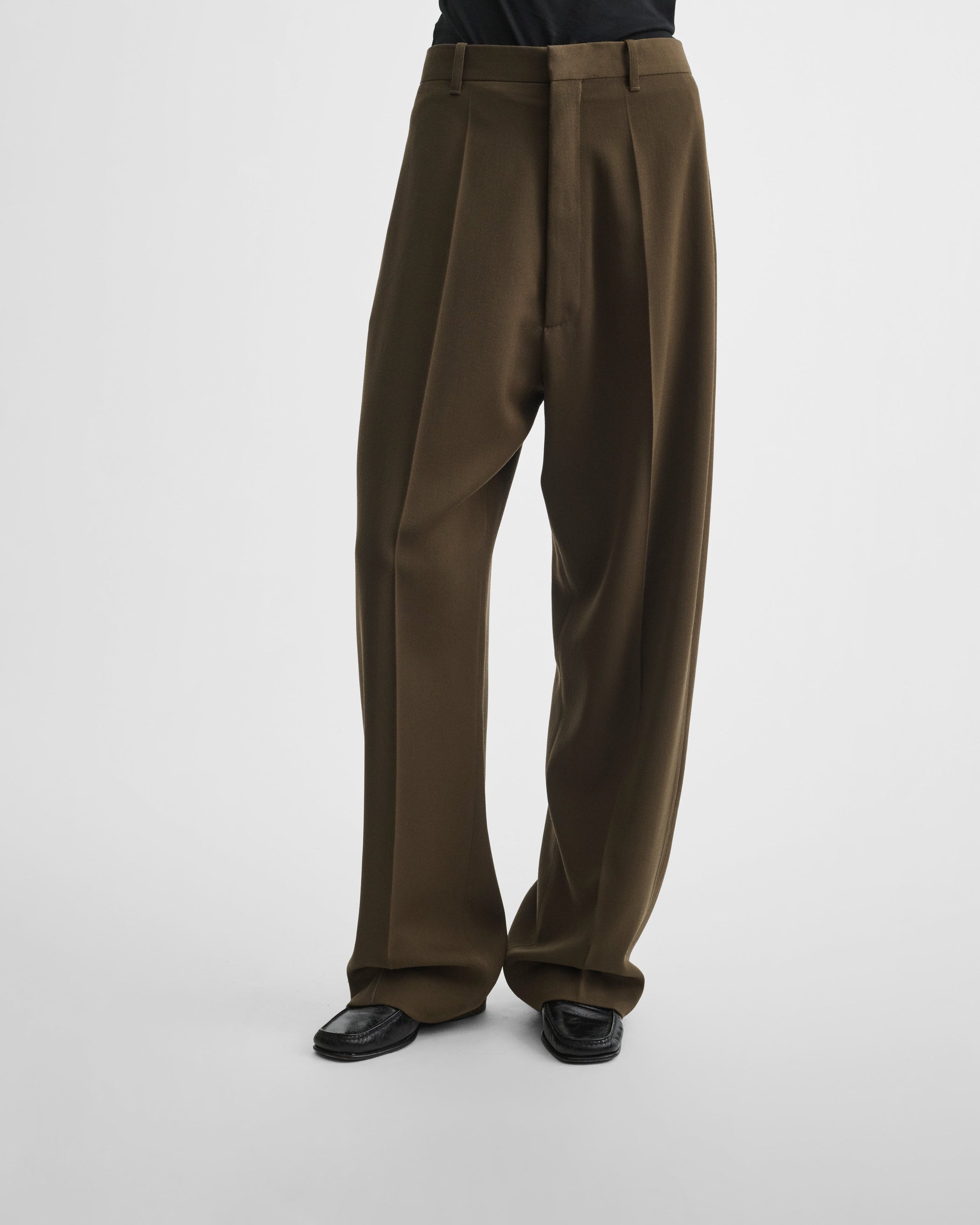 Front view of model wearing DROP TROUSERS in shroom wool