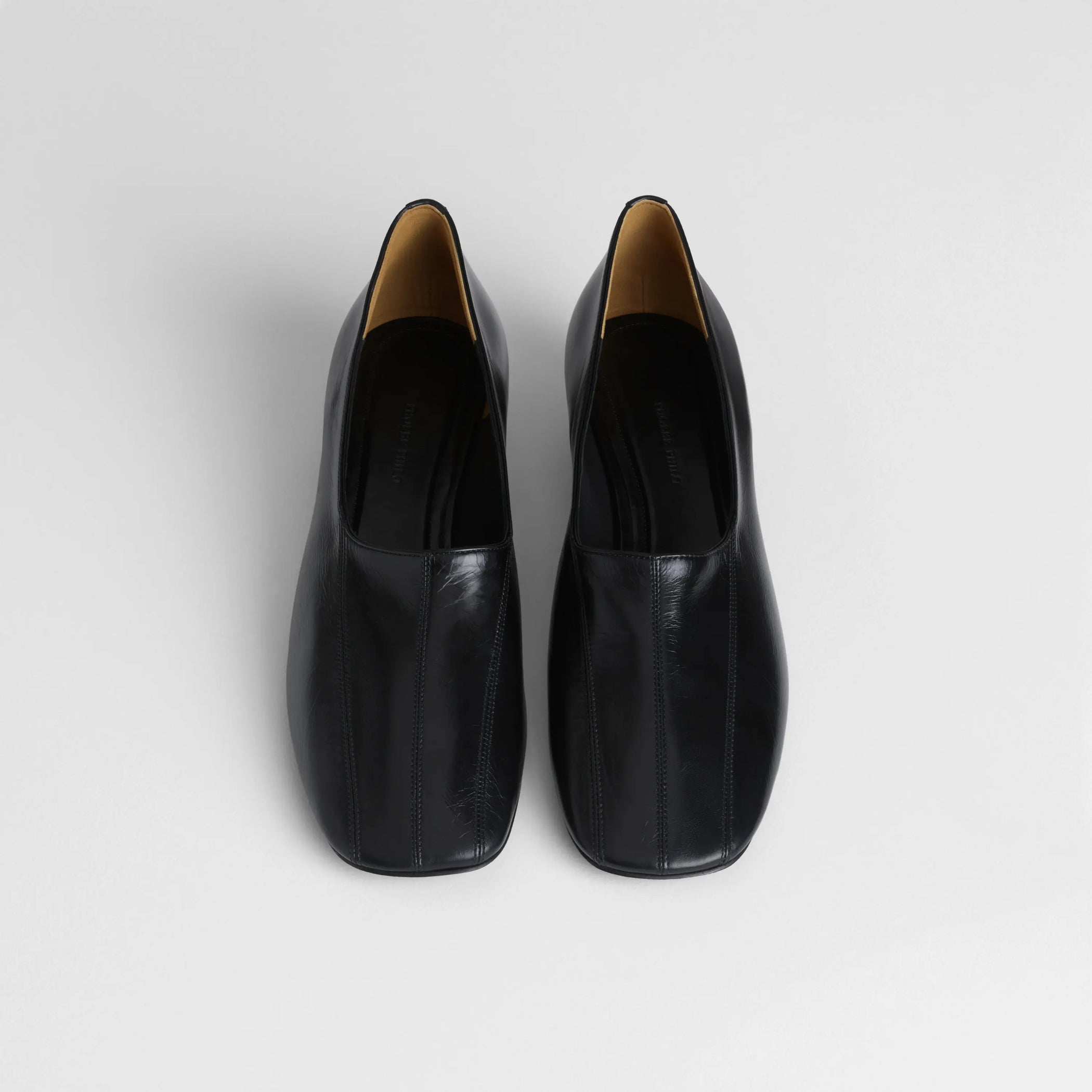 Front view of club slipper in shiny calf black.