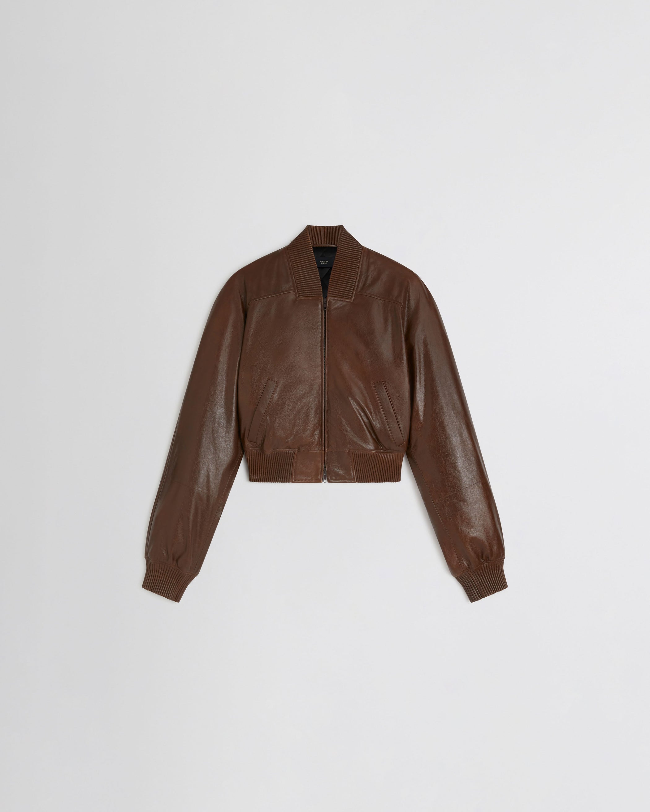 Flat front view of SHRUNK BOMBER in tobacco leather