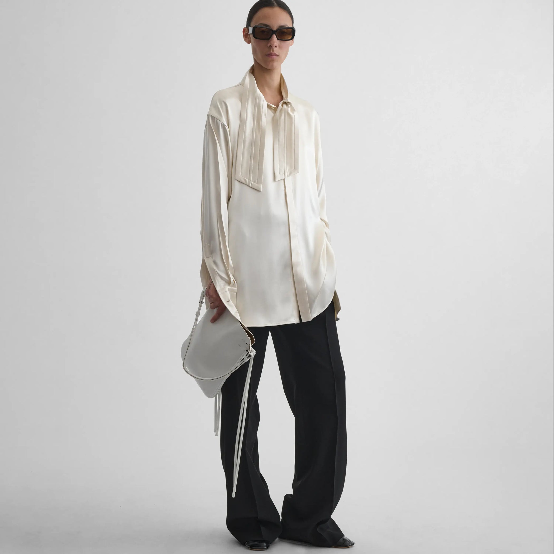 PHOEBE PHILO ウォッシュ加工のオフホワイトデニム PHOEBE PHILO | CLASSIC JEANS | OFF WHITE SILK VISCOSE