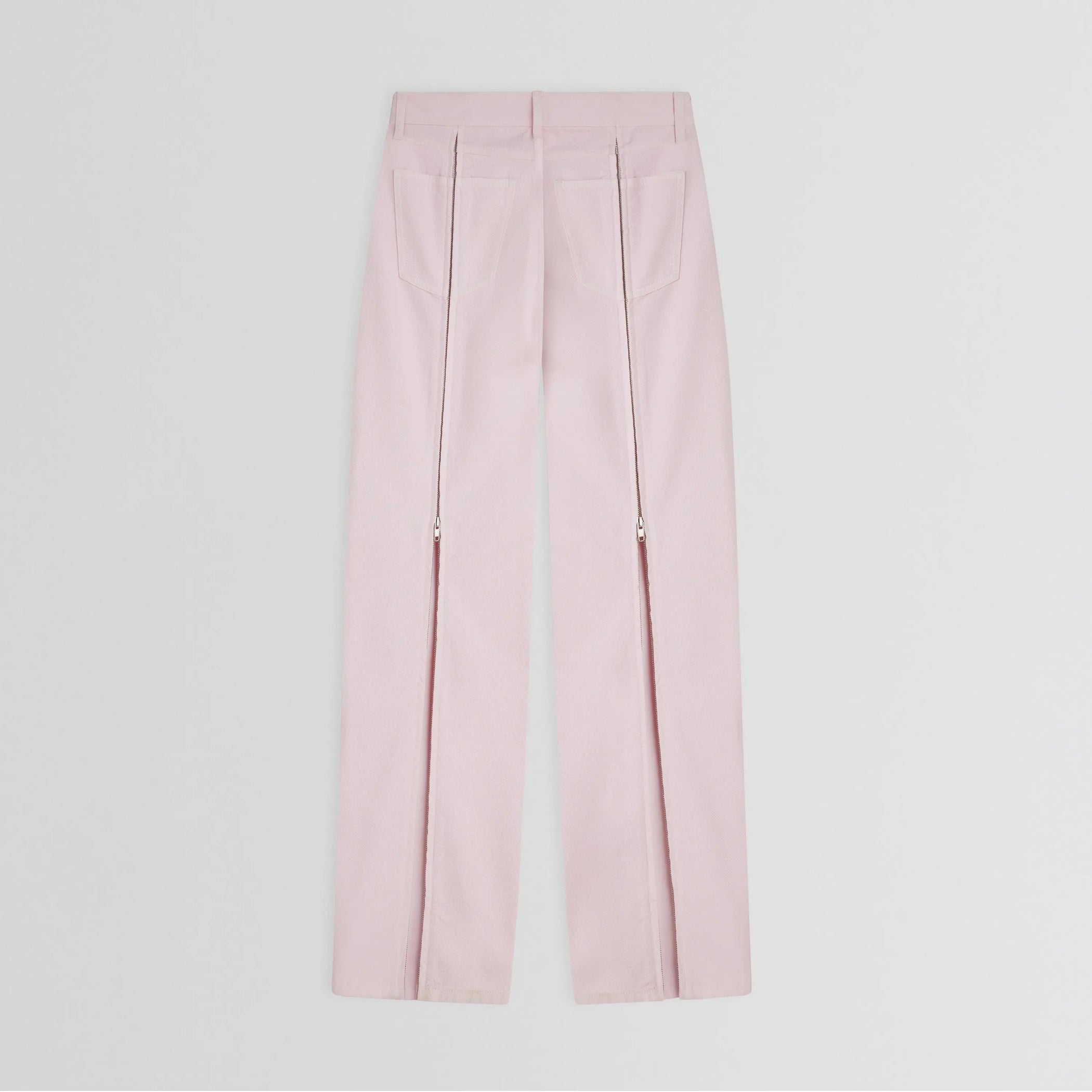 Flat back view of zip jeans in pale pink cotton
