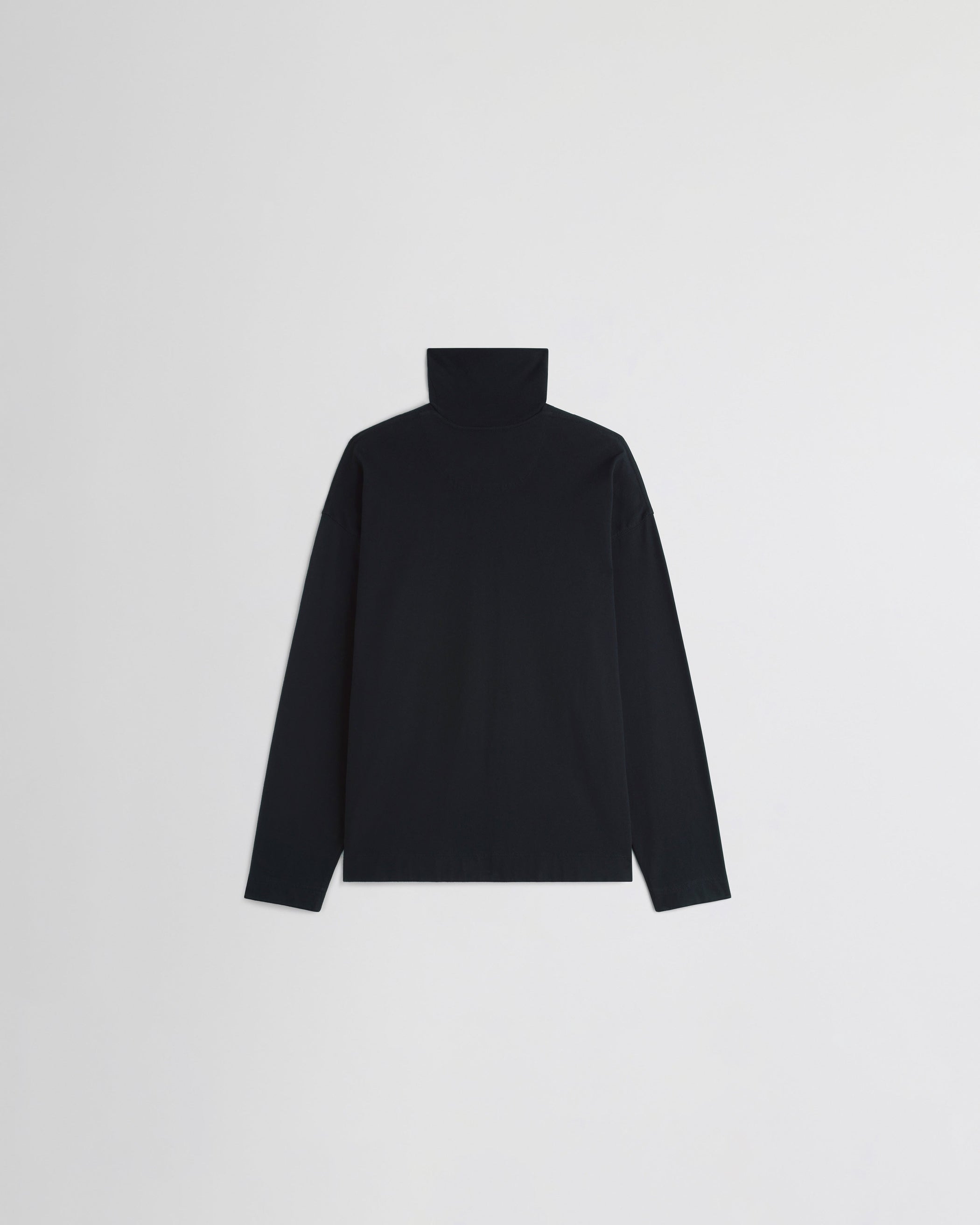Flat back view of RELAXED LONG SLEEVE JERSEY in black cotton jersey