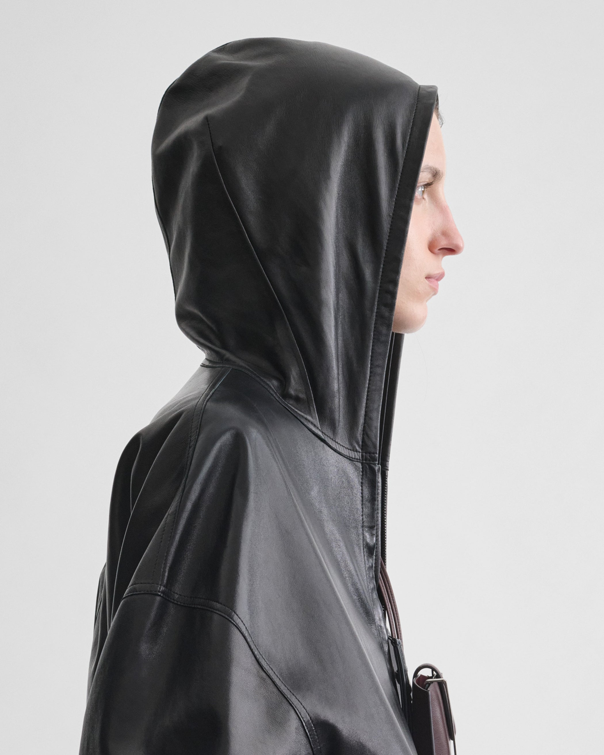 View of HOODED BOMBER in black leather