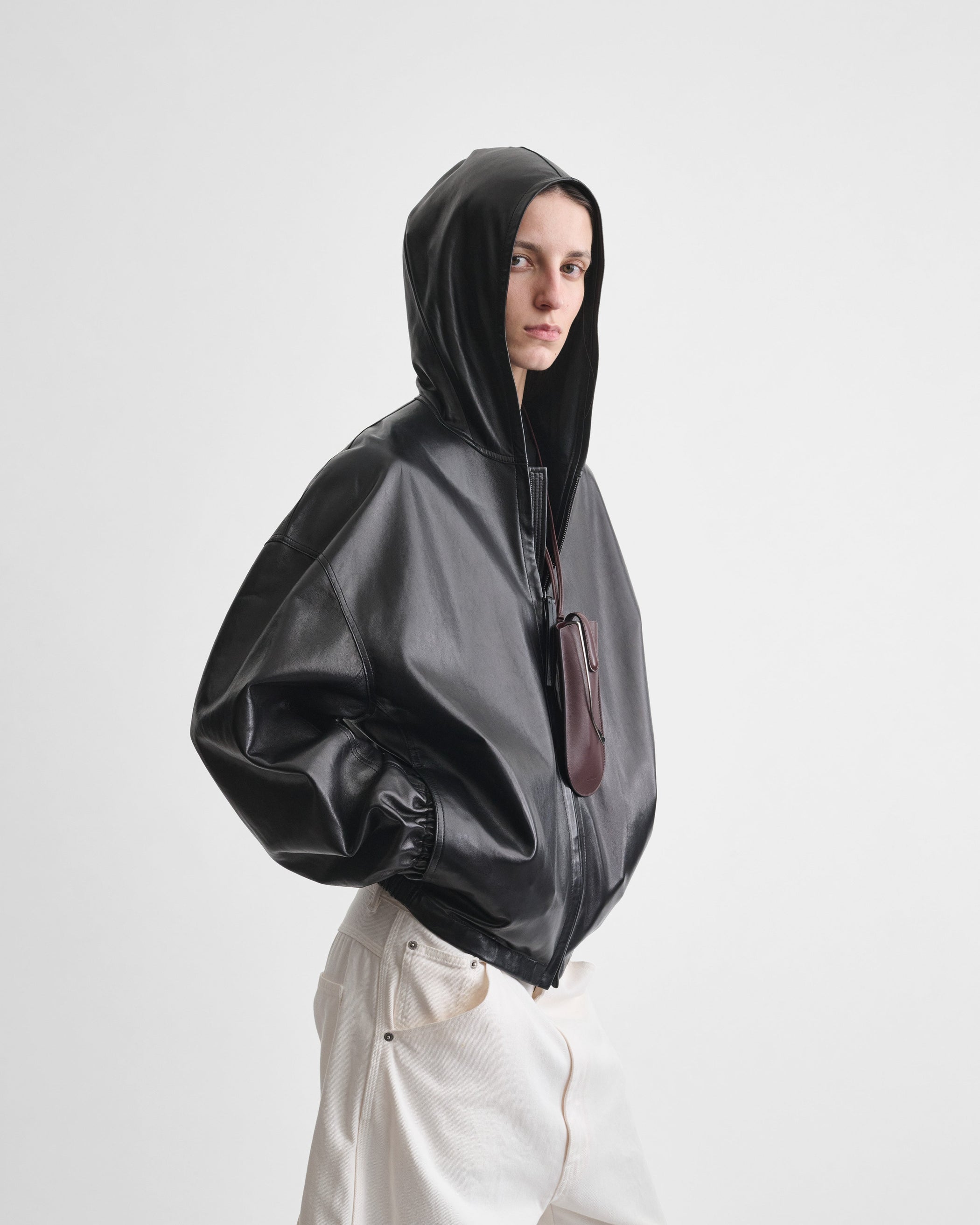 View of HOODED BOMBER in black leather