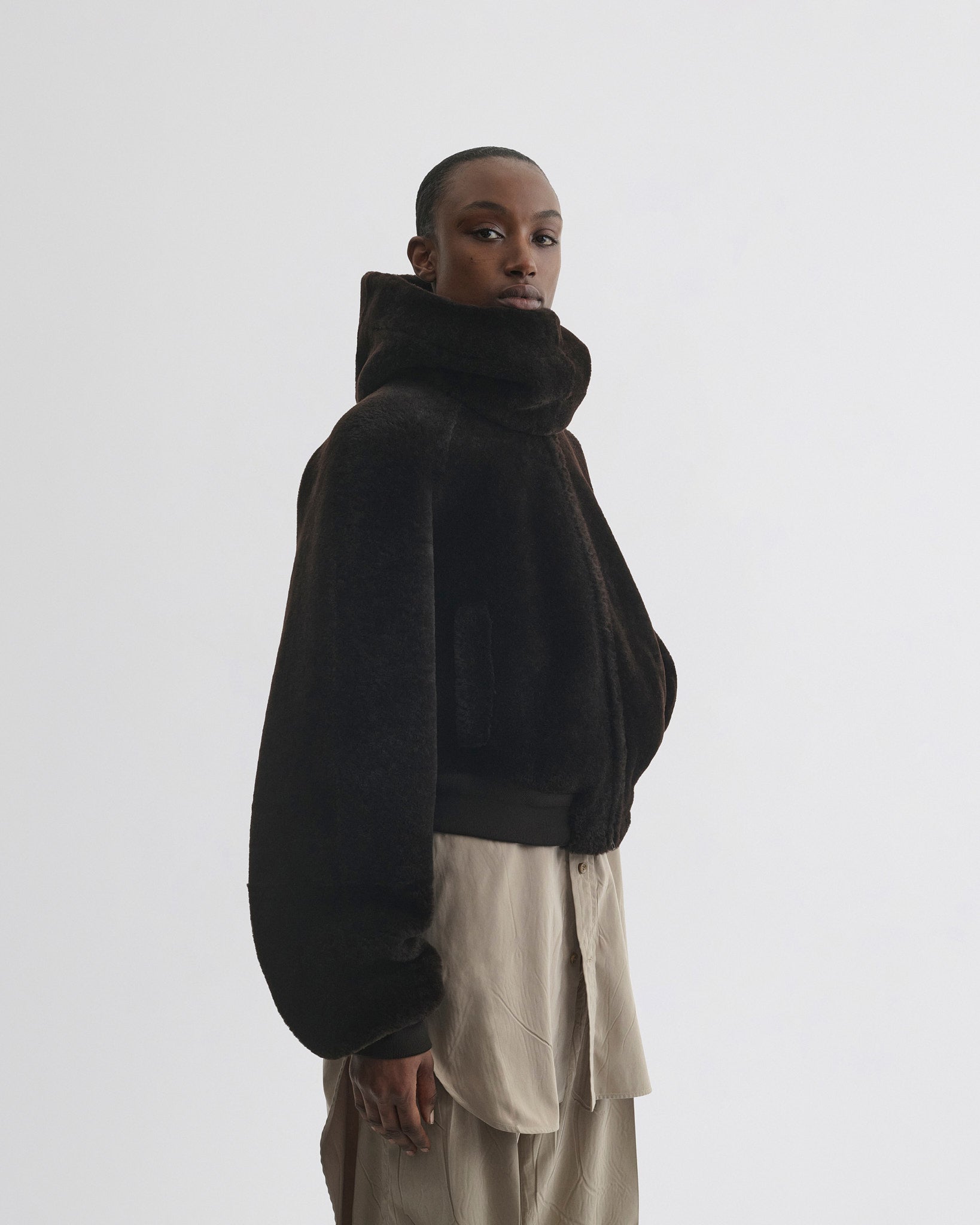 Side view of Super Soft Bomber Jacket in deep brown shearling