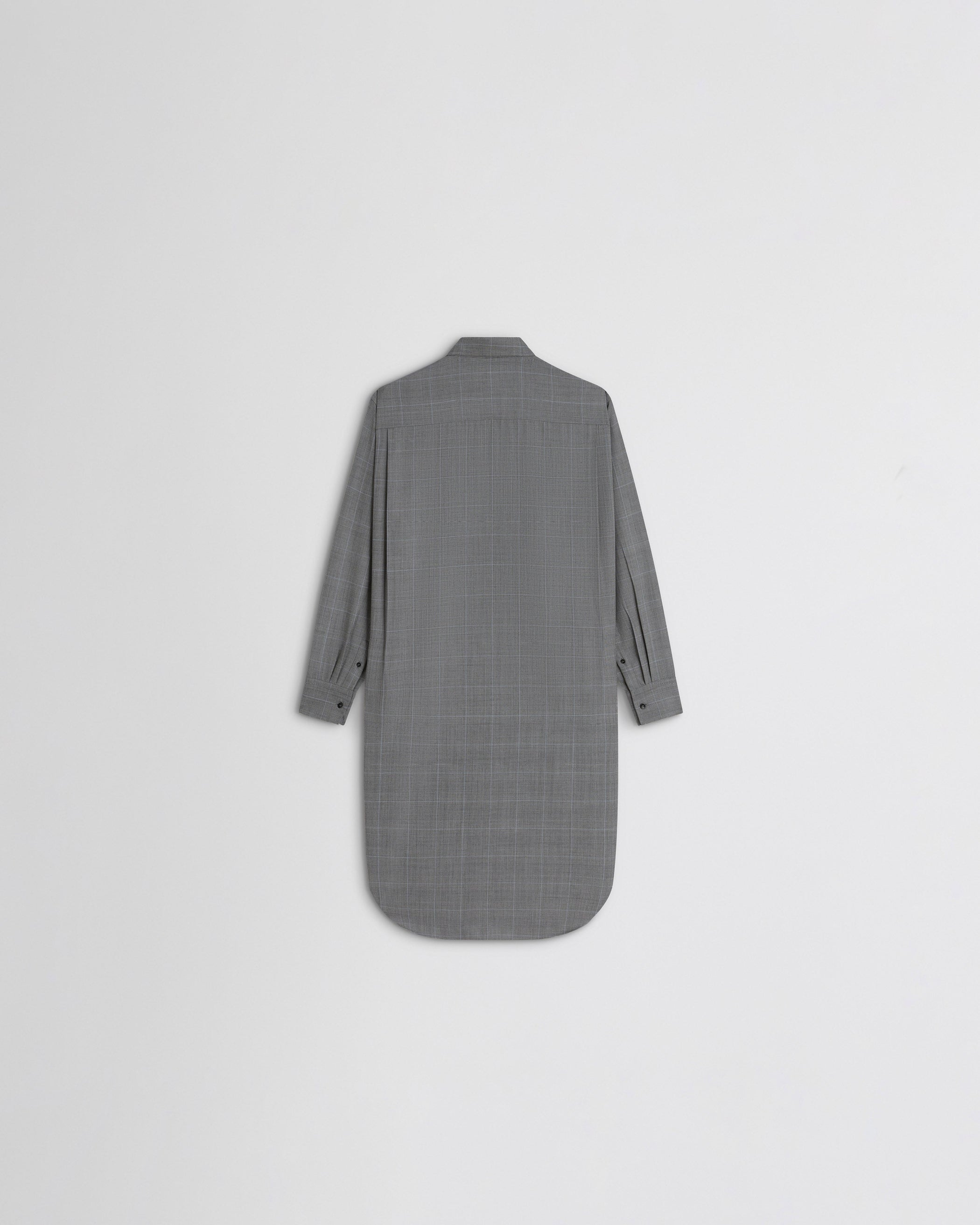 View of elongated shirt in black-blue wool