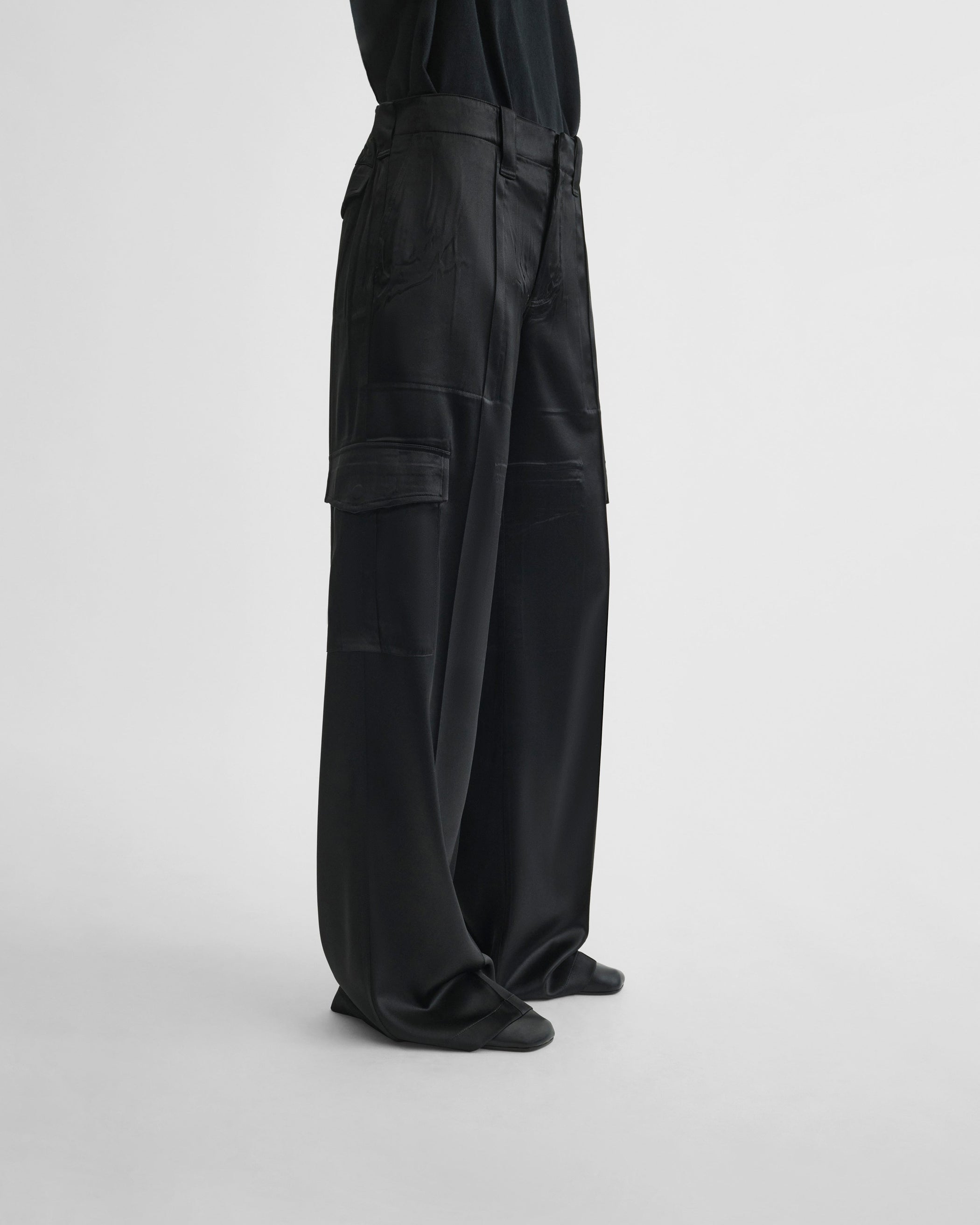 View of liquid cargo trousers in black silk