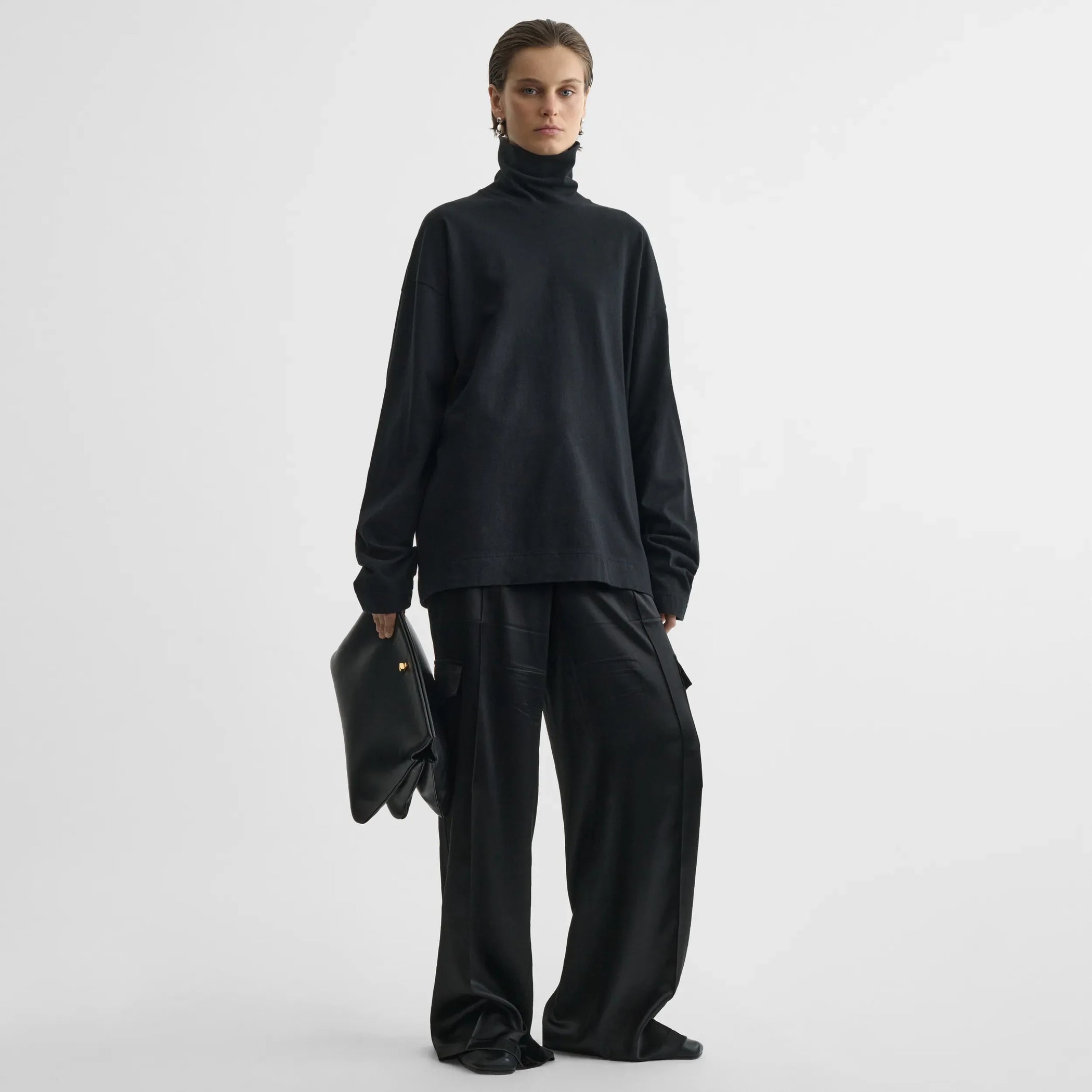 Front view of liquid cargo trousers in black silk