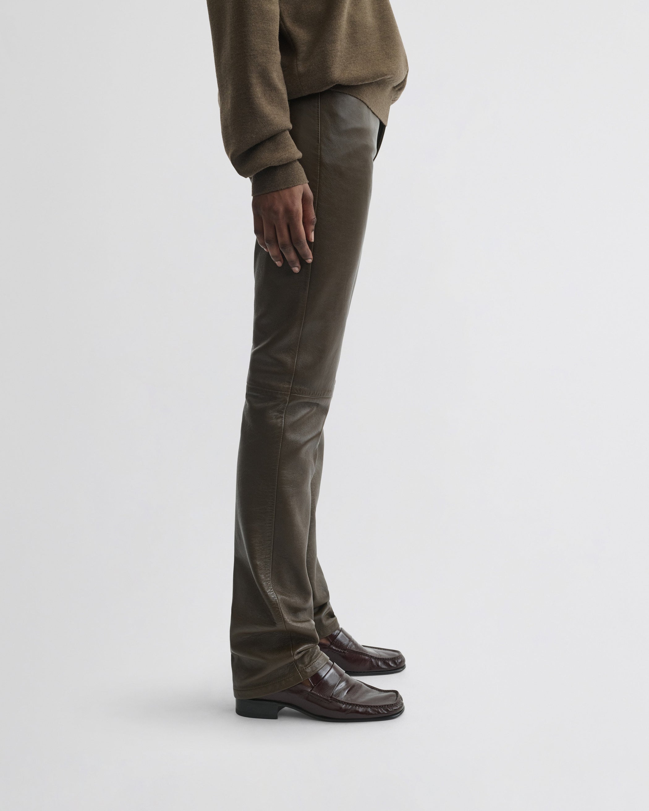 View of straight leg jeans in green bronze leather