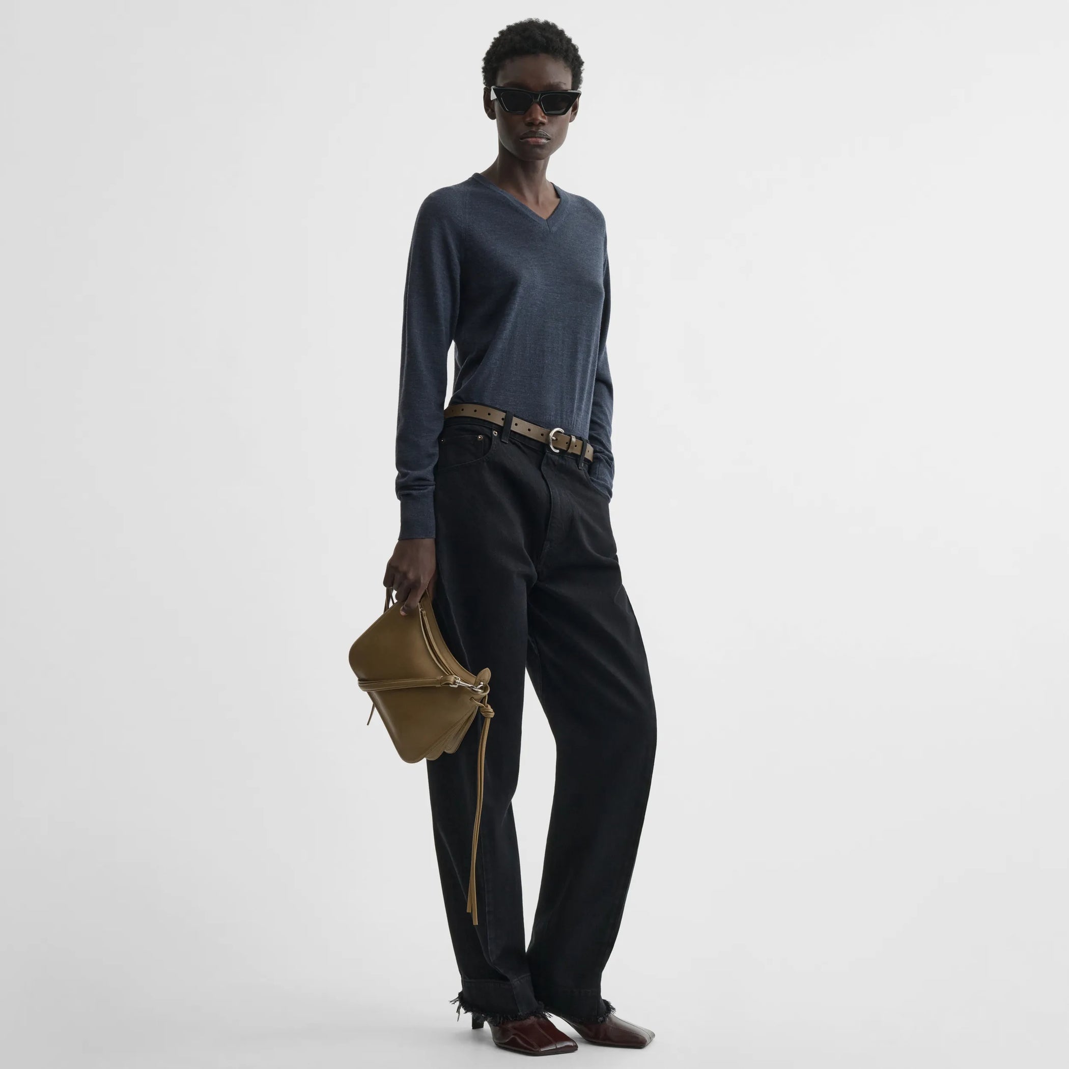 Front view of arch jeans in black cotton