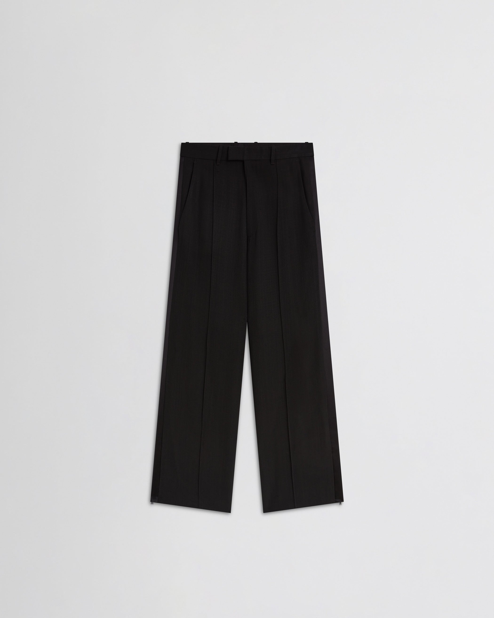 View of split tux trousers in black wool