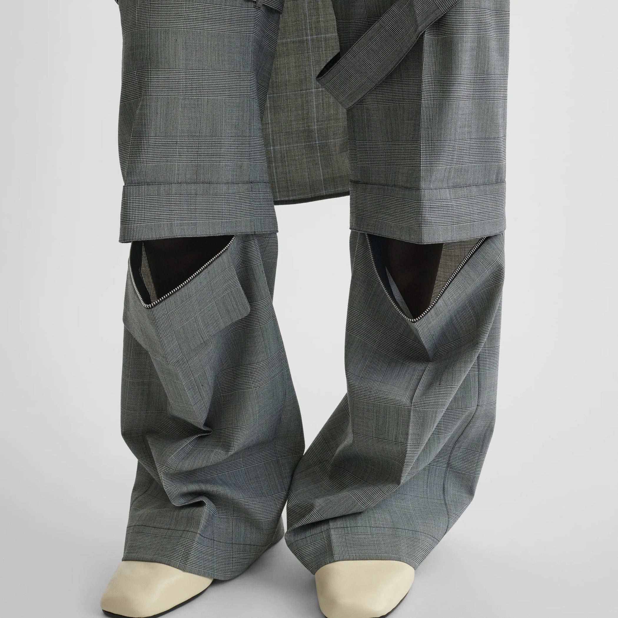 Close up detail view of zip cargo trouser in anthracite wool