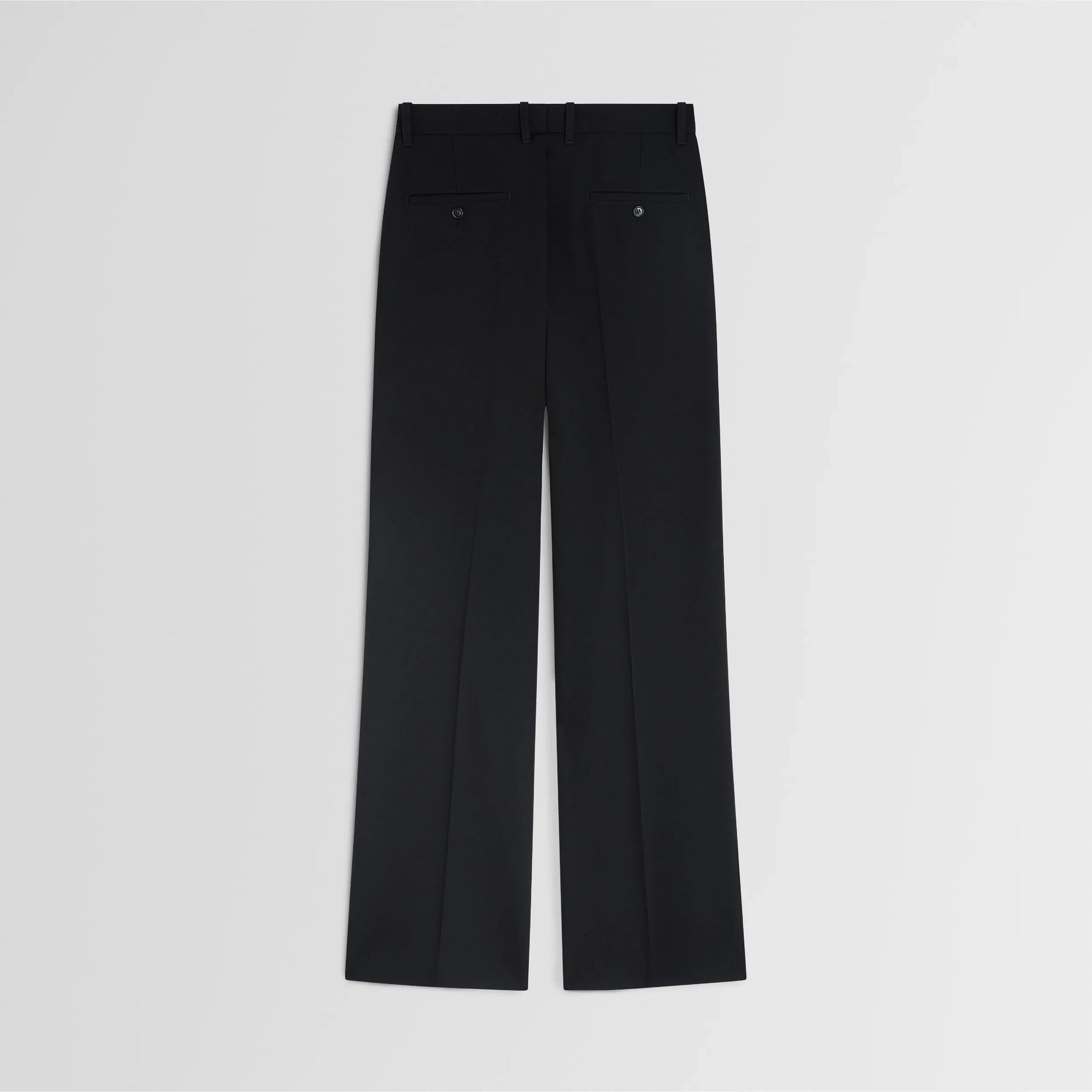 Flat back view of boyish tailored trousers in black wool