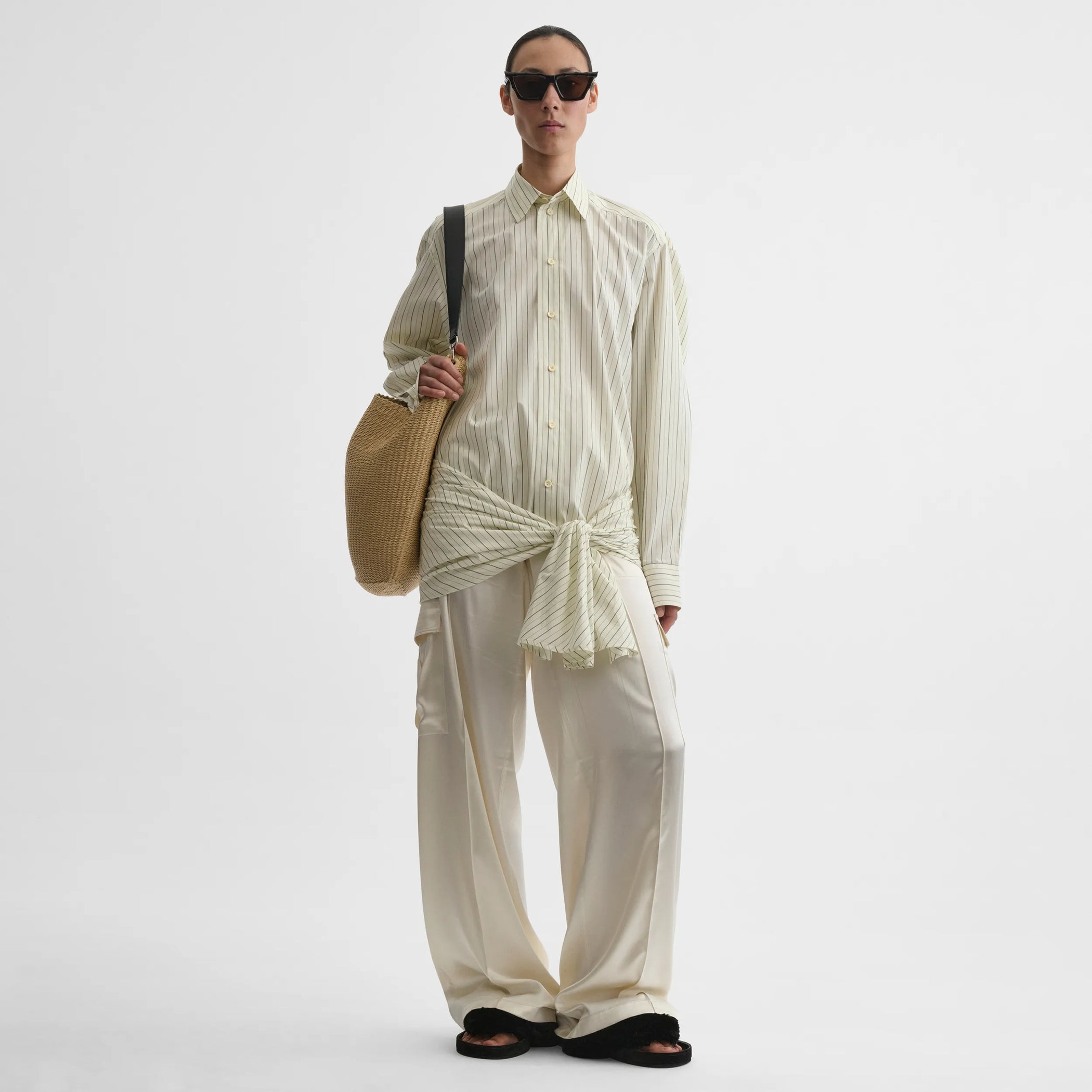 Front view of dropped front shirt in pale lemon cotton