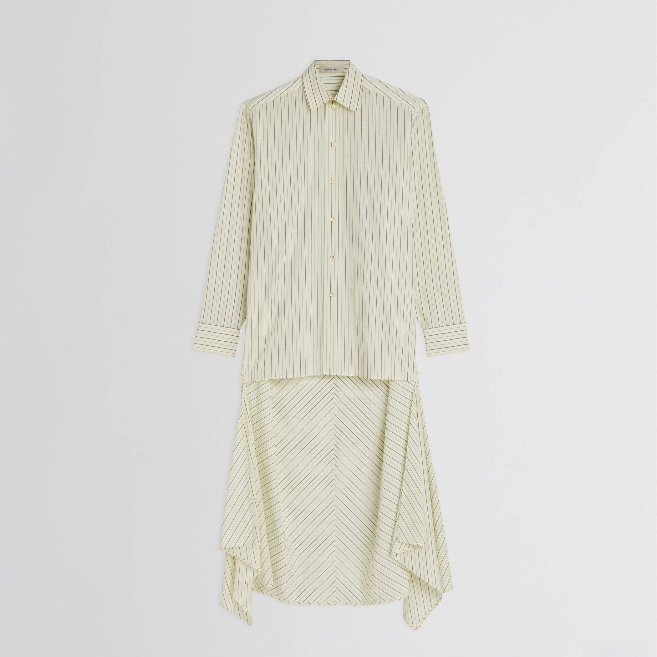 Flat front view of dropped front shirt in pale lemon cotton 