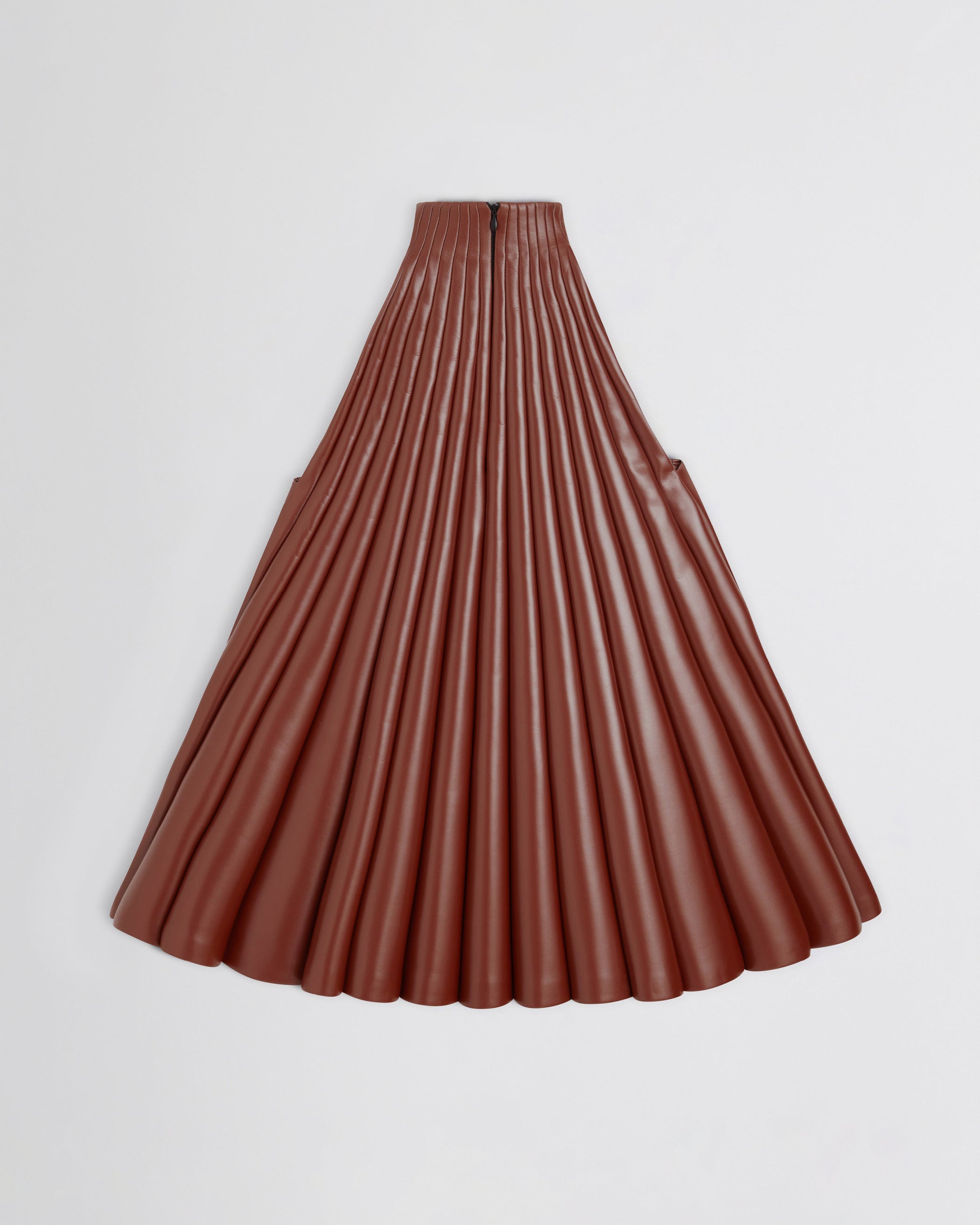 Flat back view of Accordion Top in brick bonded jersey