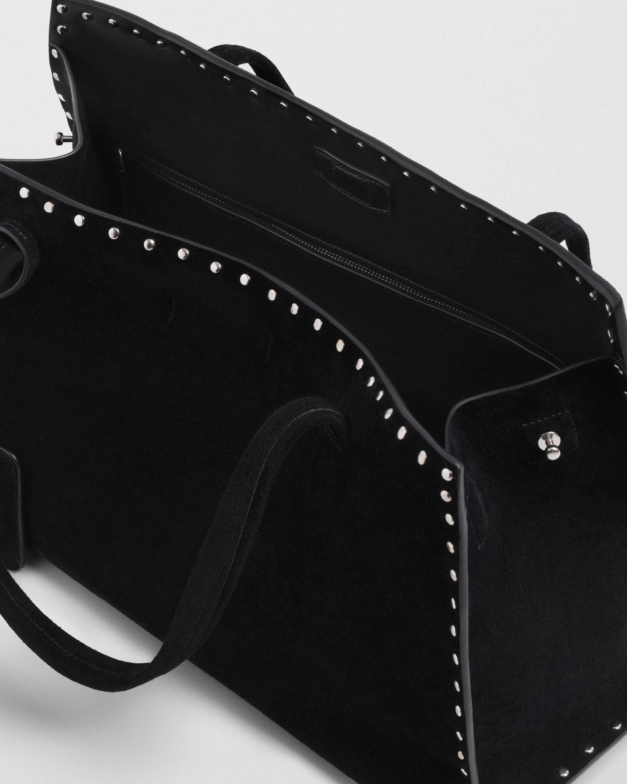 Close up detail view of SMALL STUD CABAS in black suede