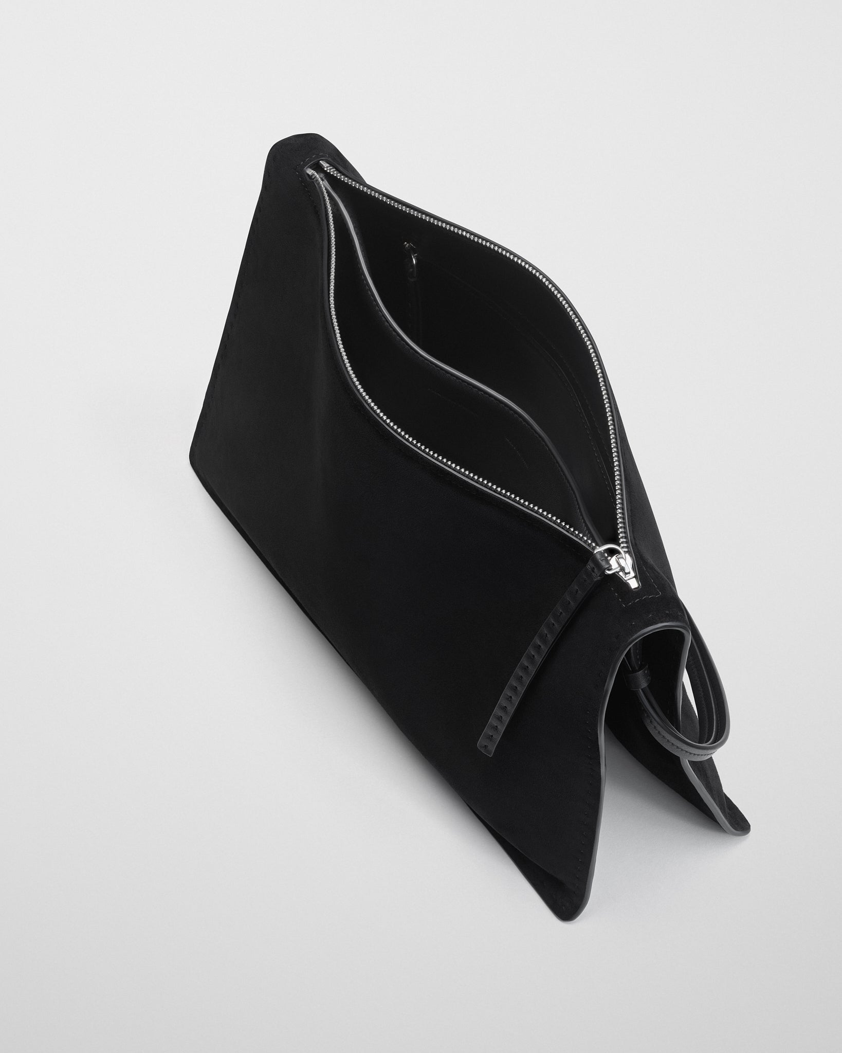 Close up view of GLOVE POCHETTE in black suede.