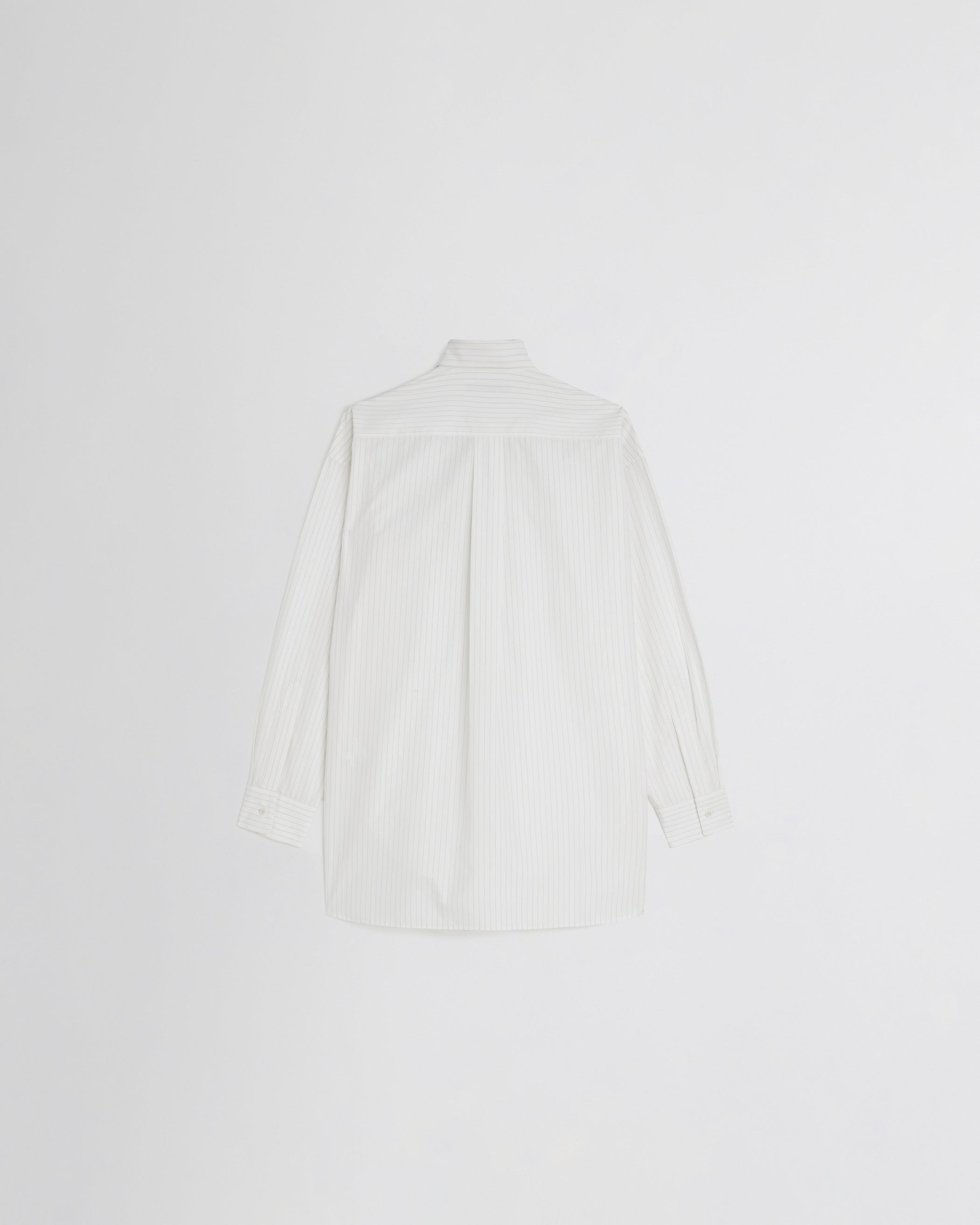 Flat back view of RELAXED TAILORED SHIRT in white/beige cotton
