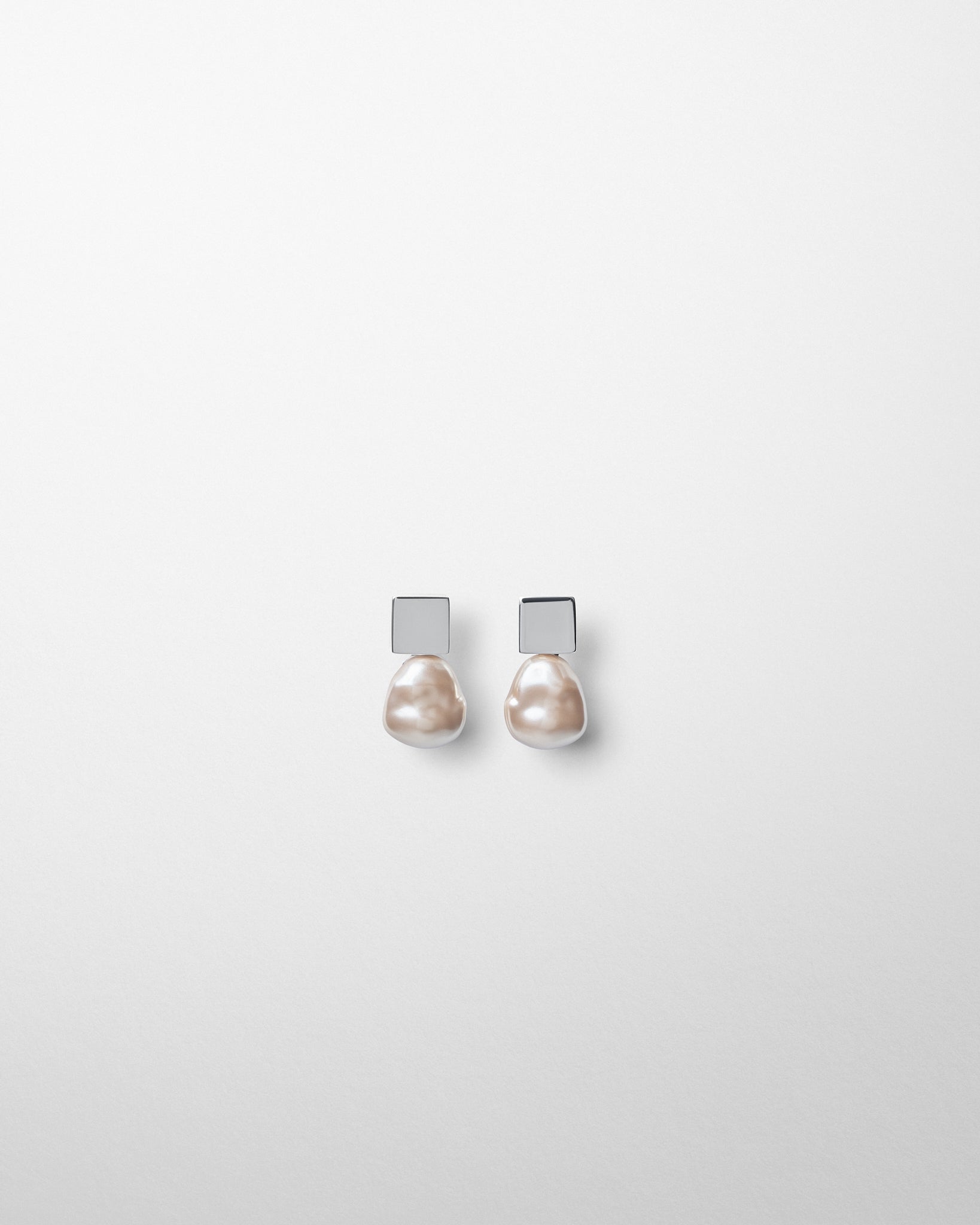 View of PEAR DROP EARRINGS in blush resin