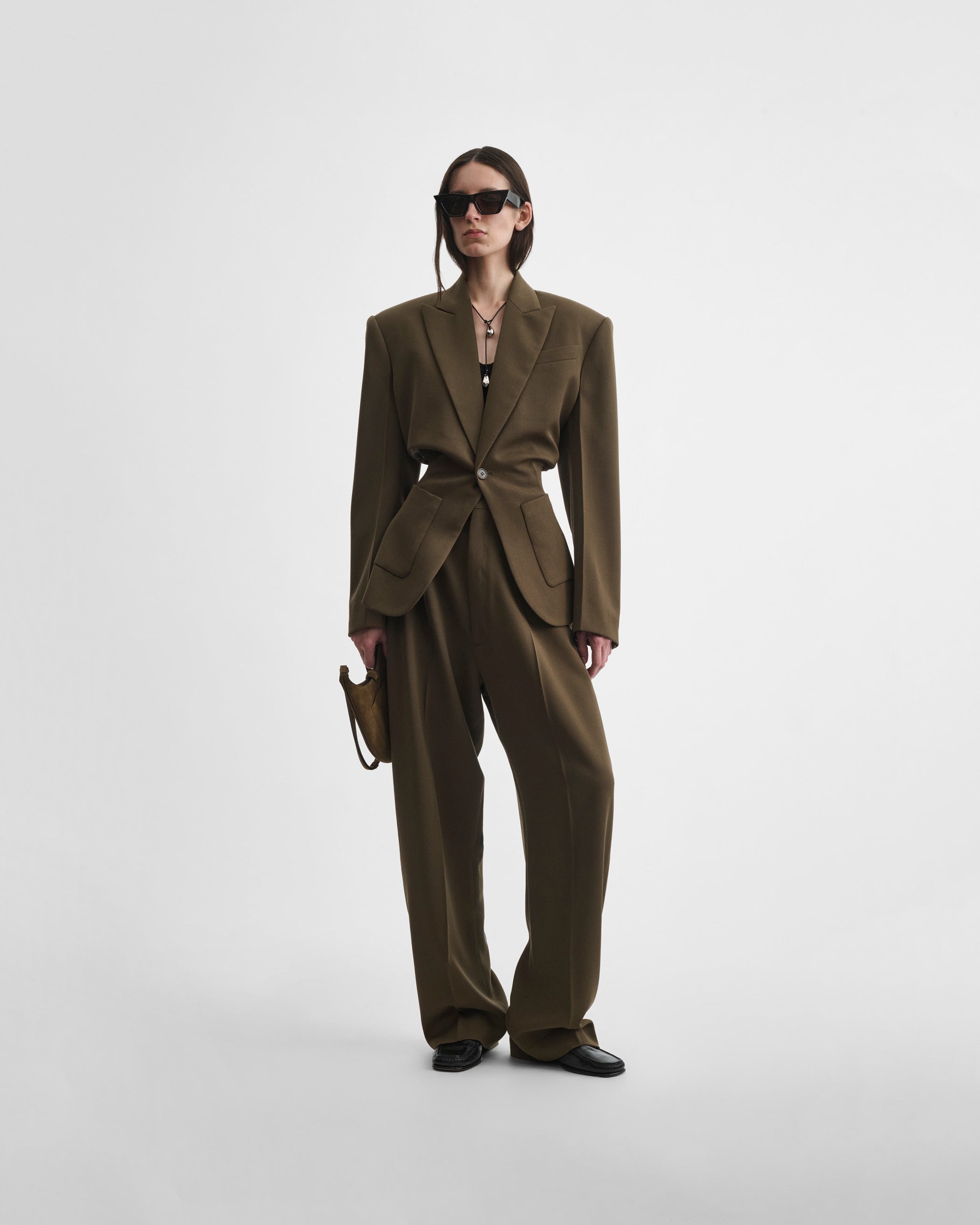 Front view of model wearing KICK TAILORED JACKET in shroom wool